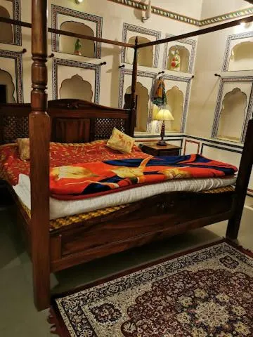 Bed in Hotel Radhika Haveli, Mandawa