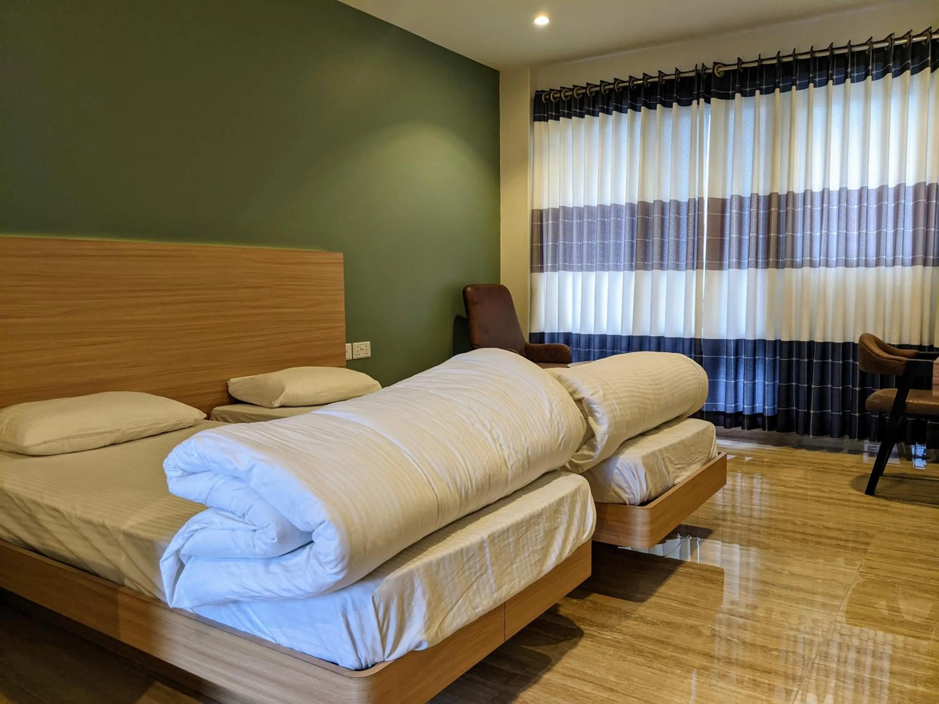 Bed in Gantavya Resort