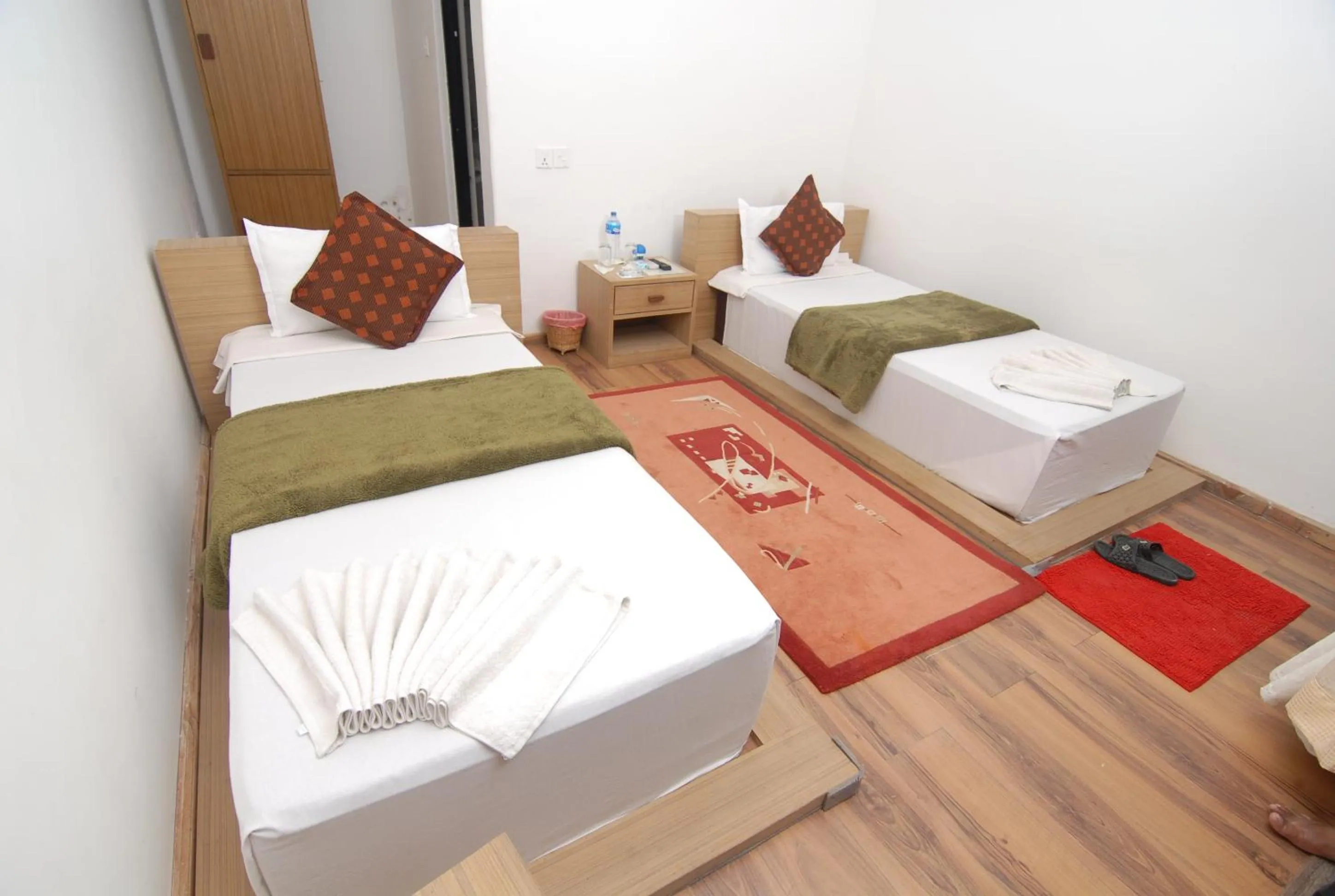 Bed in Gantavya Resort