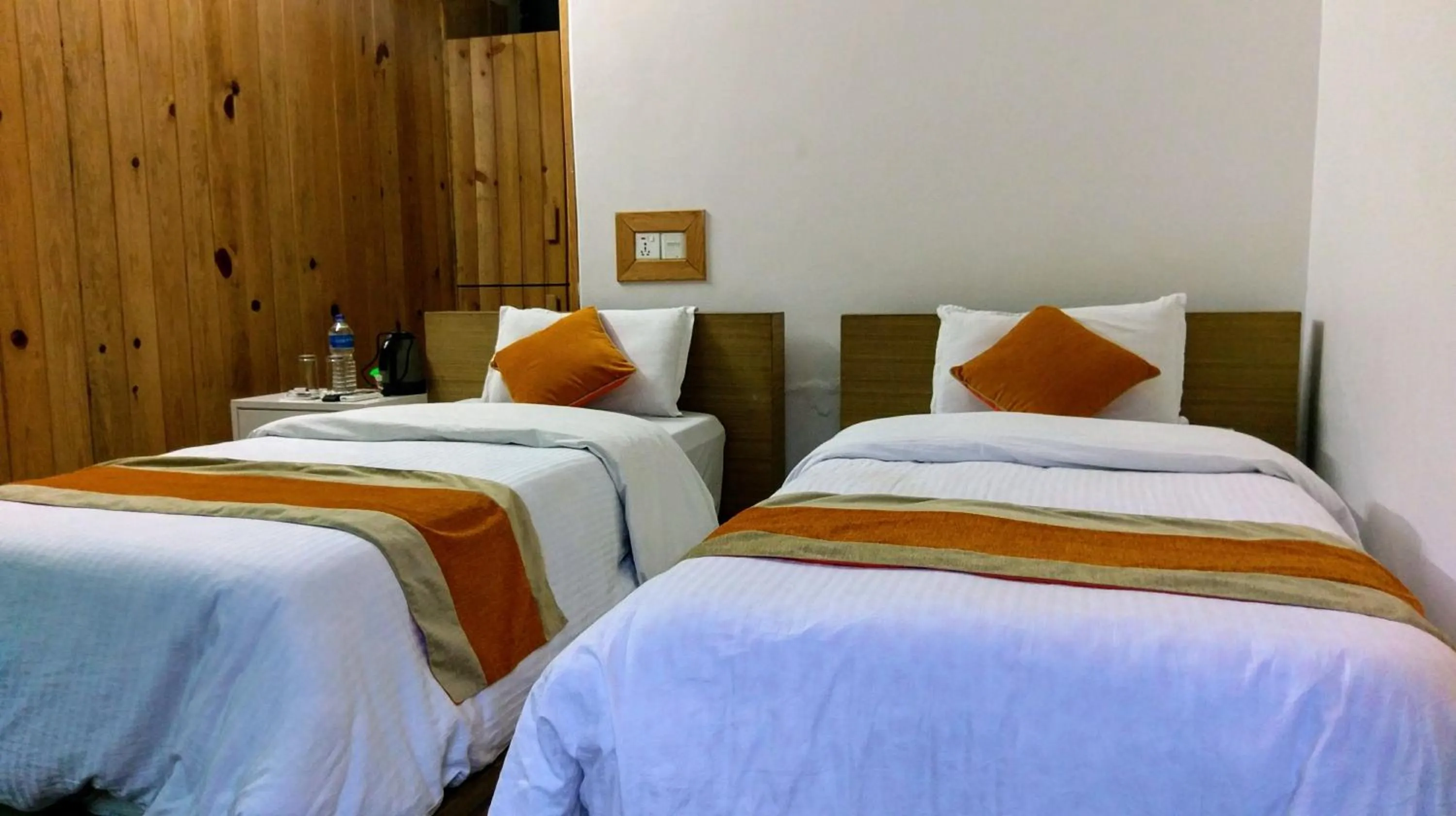 Bed in Gantavya Resort