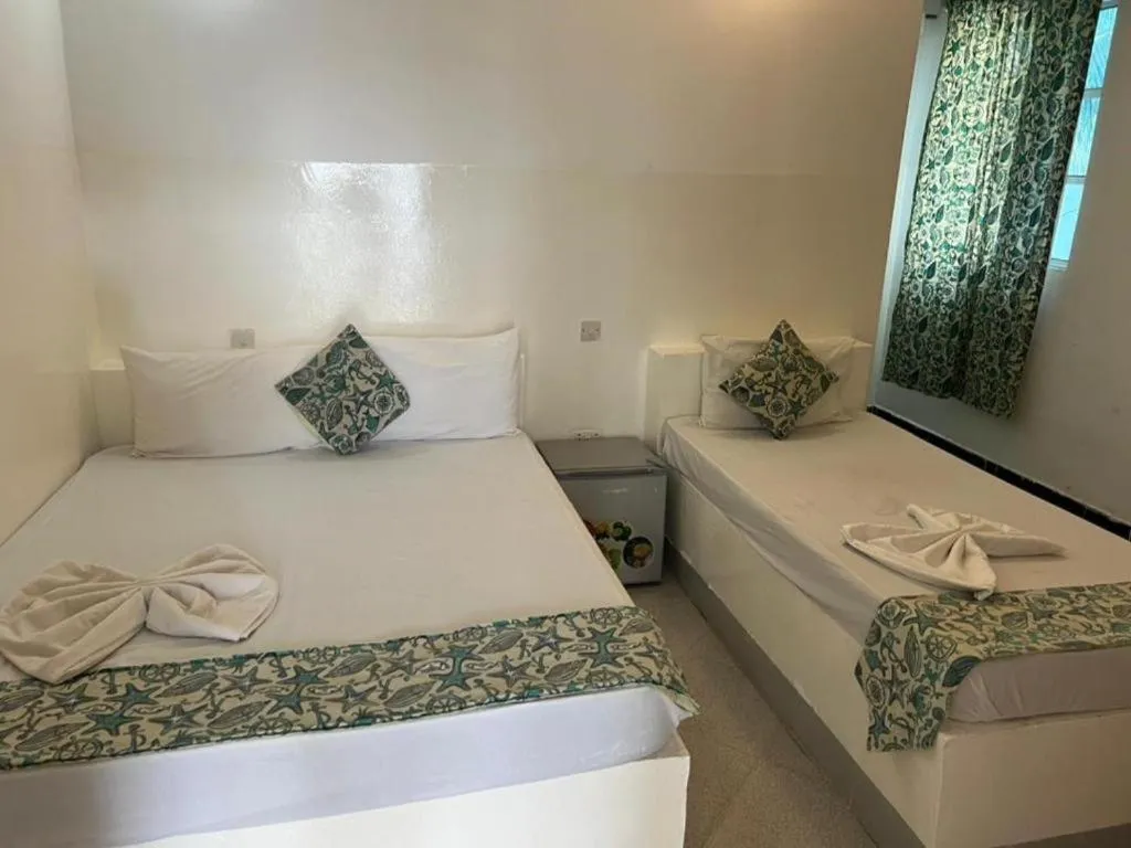 Photo of the whole room, Bed in Varadero Zanzibar Hotel