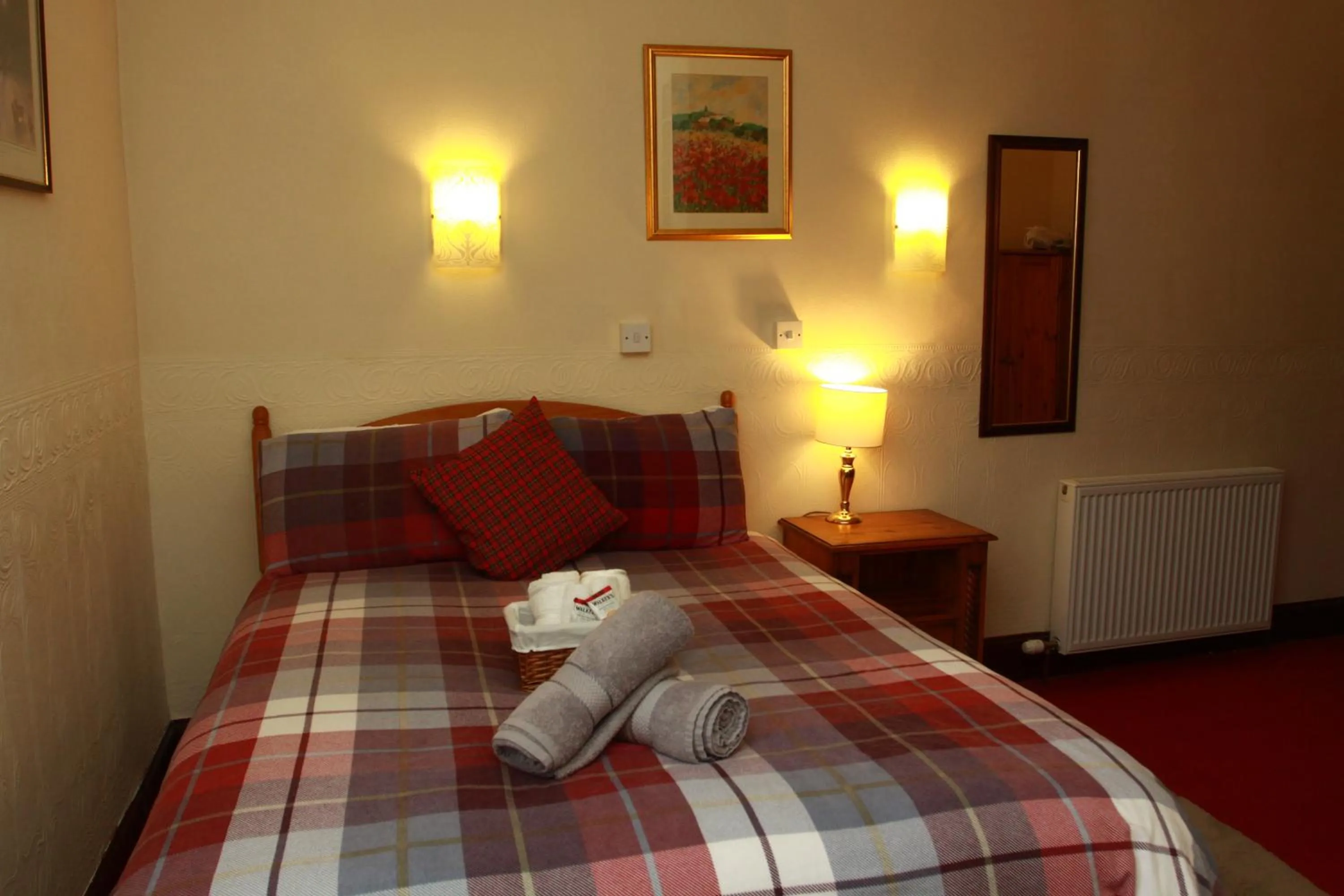 Bed in The Retreat Hotel