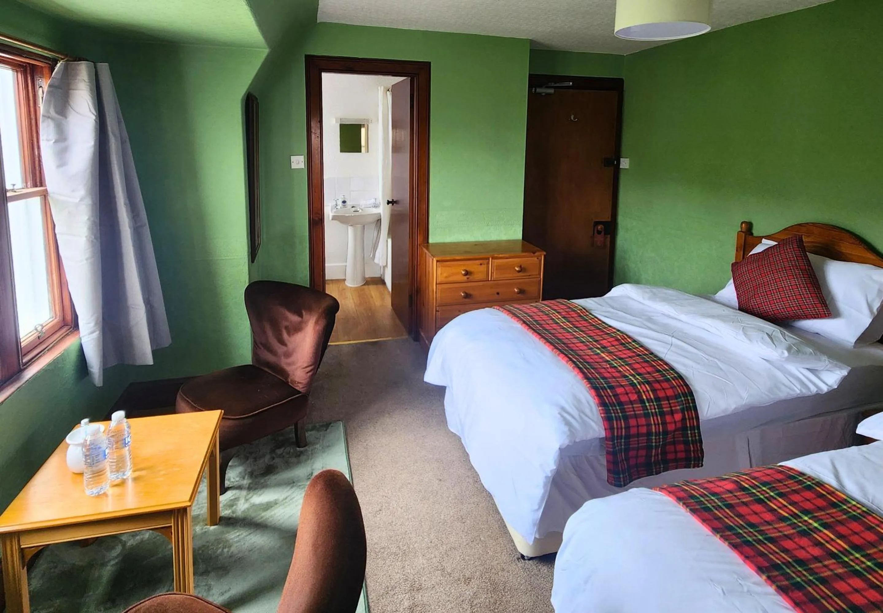 Bed in The Retreat Hotel