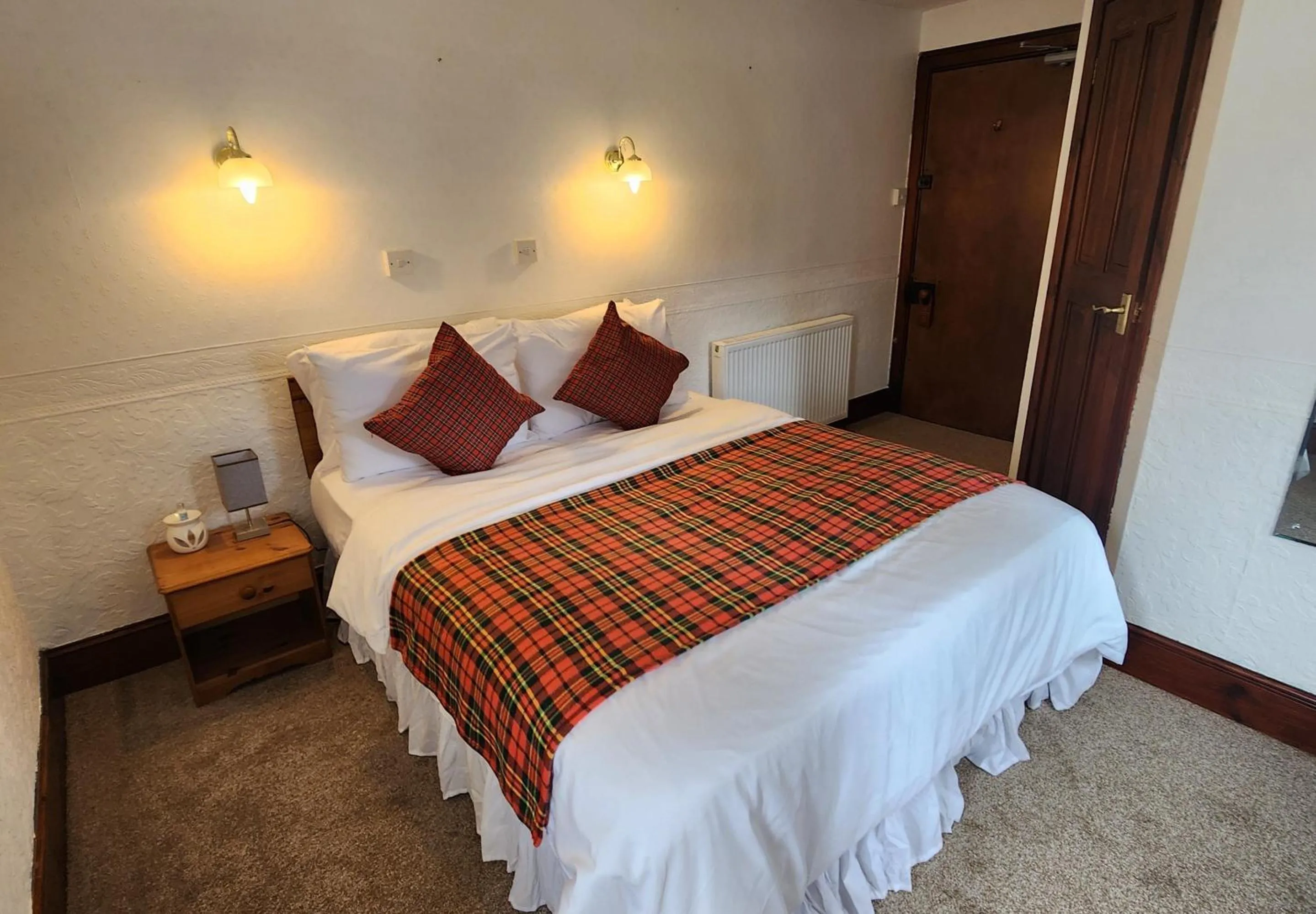 Bed in The Retreat Hotel