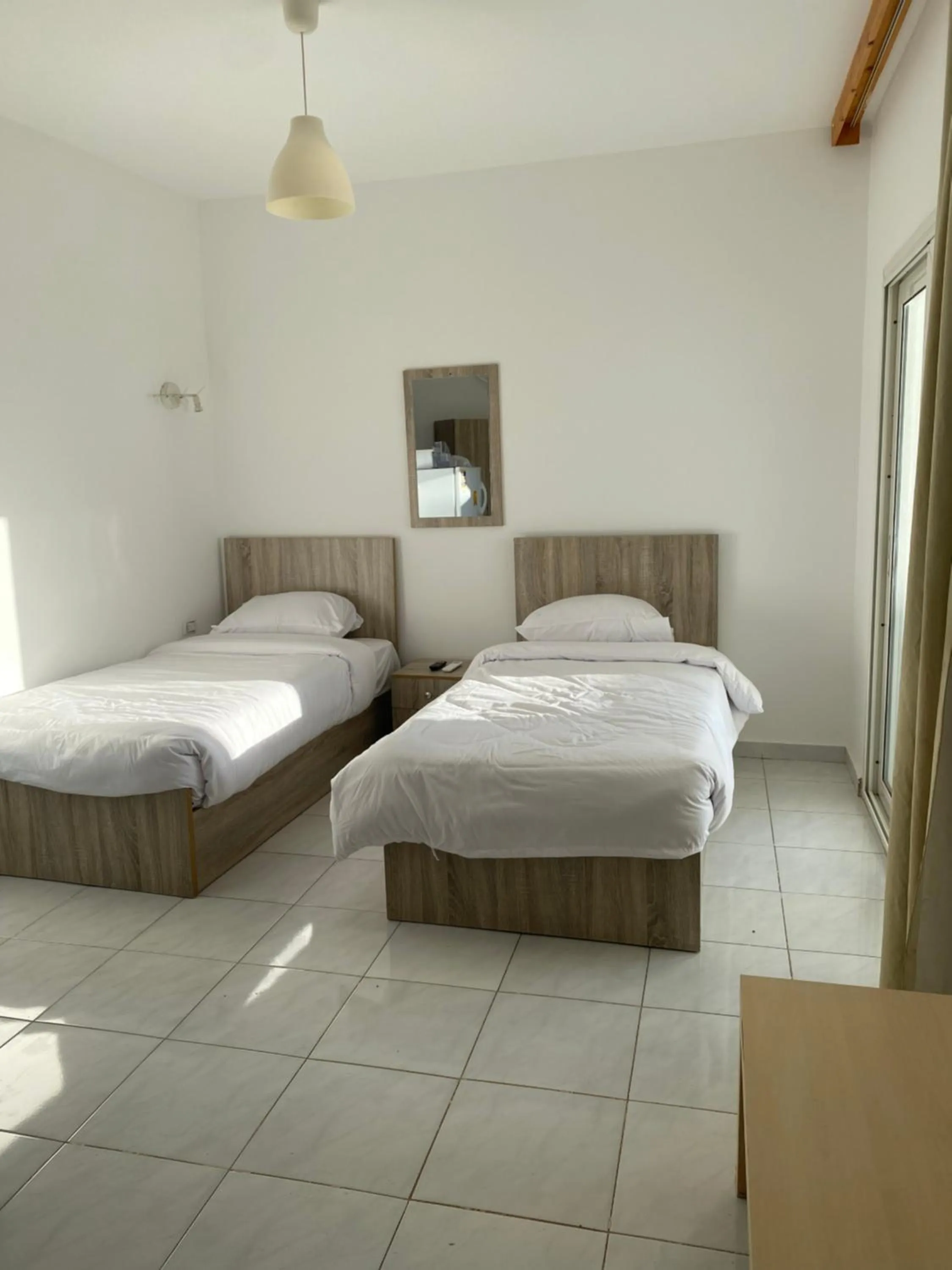 Bed in Blue Vision Diving Hotel