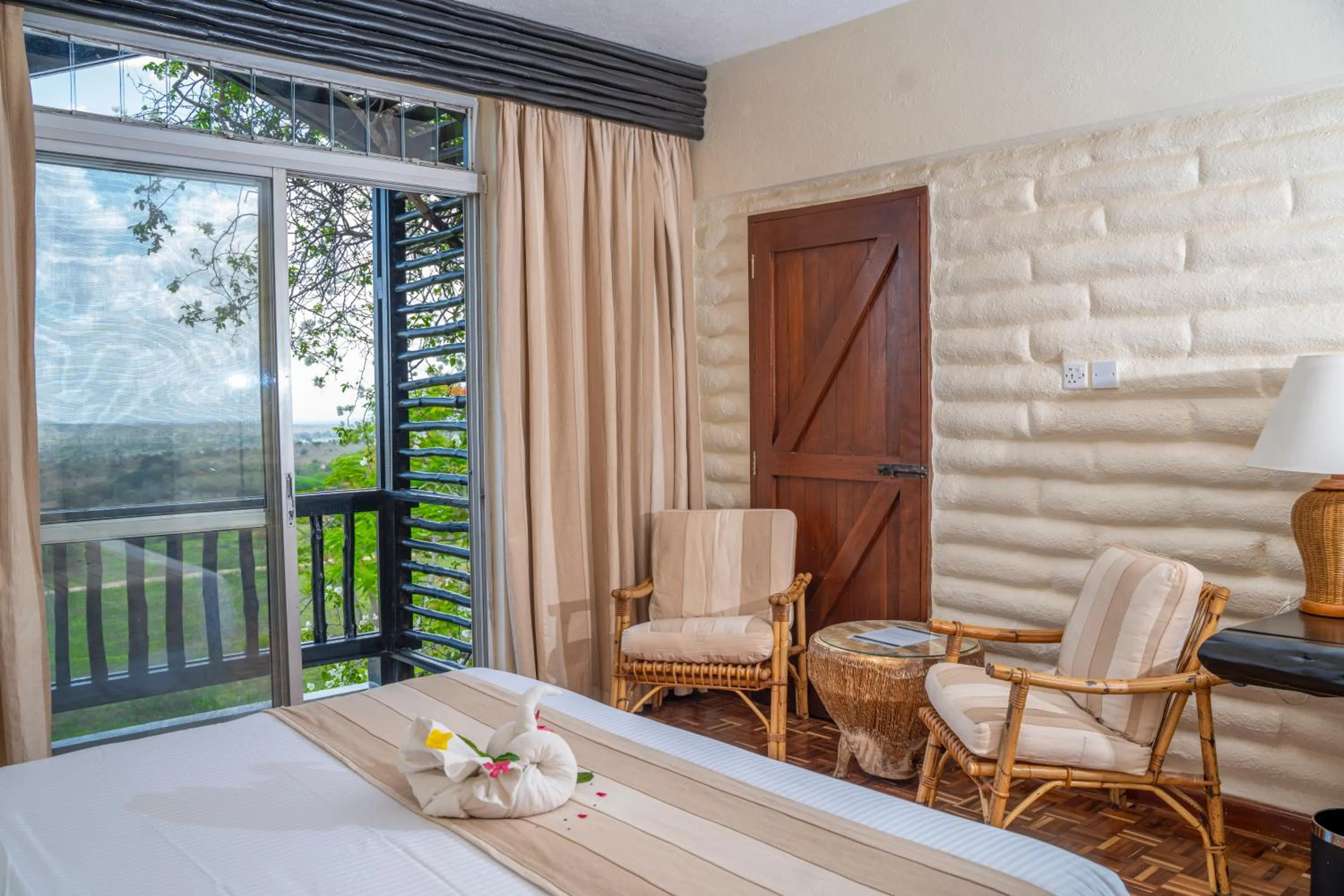 Balcony/Terrace, Bed in Taita Hills Safari Resort & Spa