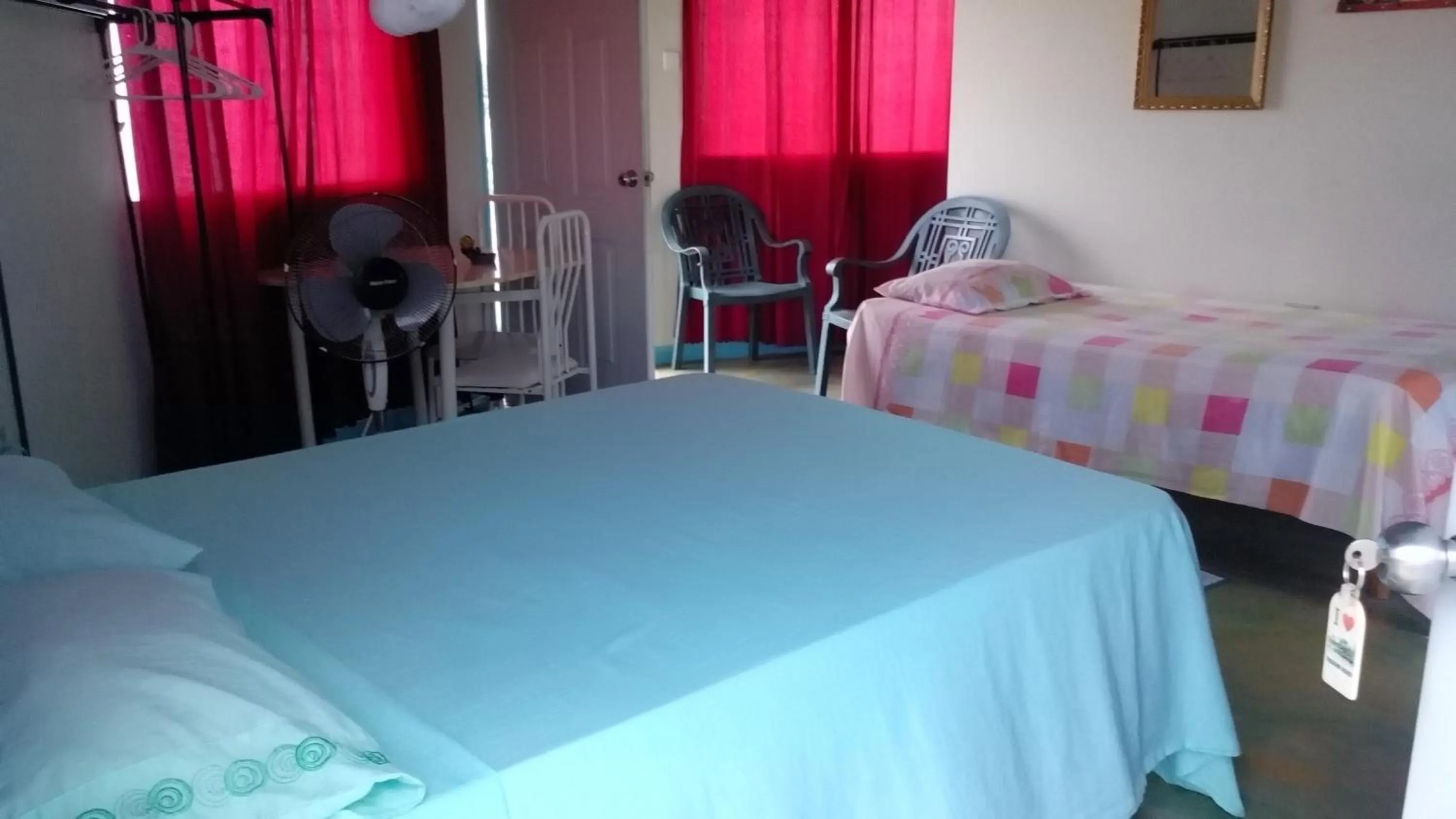 Photo of the whole room, Bed in Waikiki Guest House