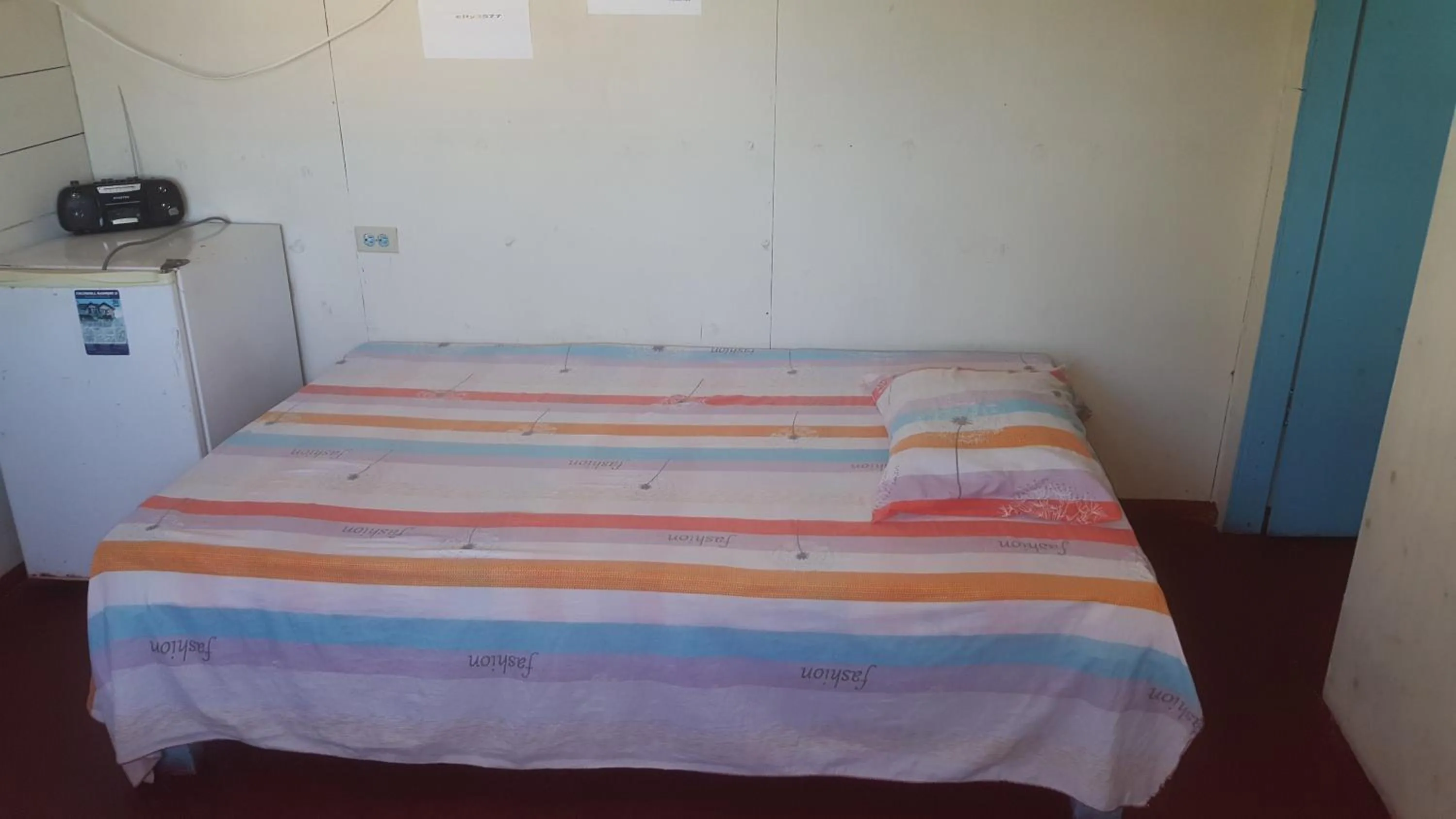 Bed in Waikiki Guest House