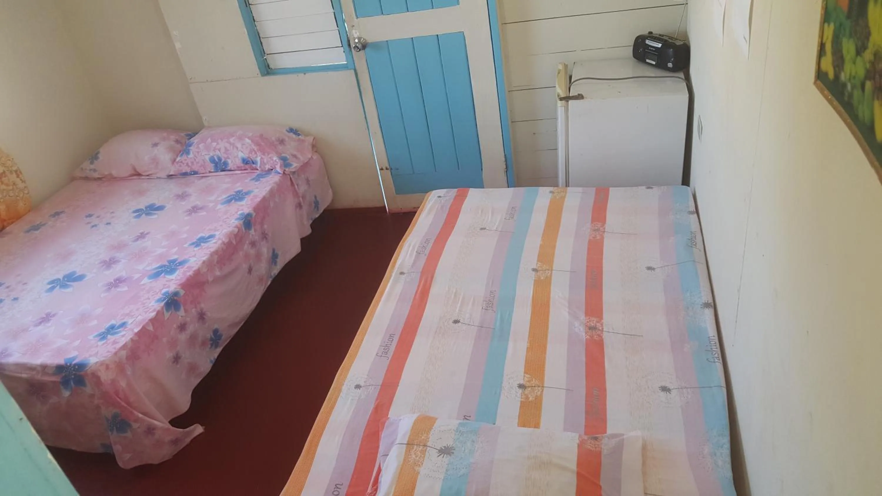 Bed in Waikiki Guest House