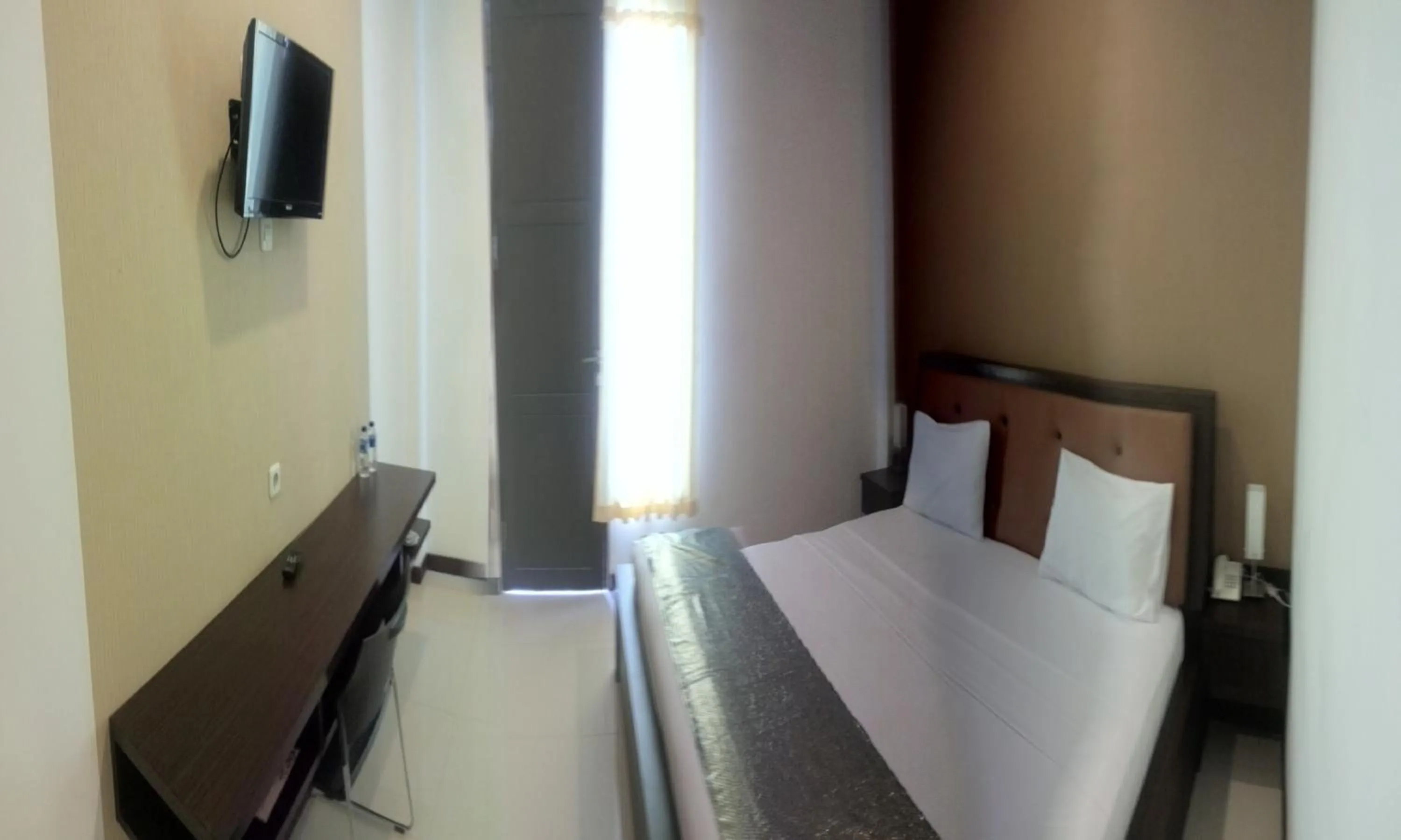 Bedroom in Jazz Hotel Palu