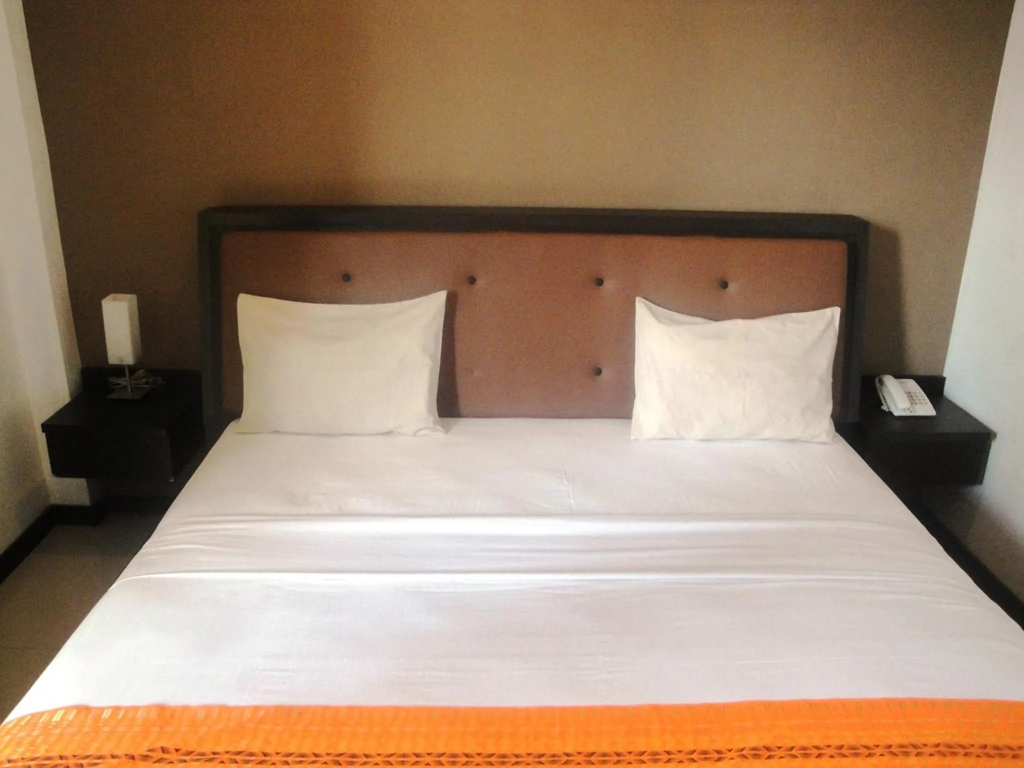 Bed in Jazz Hotel Palu