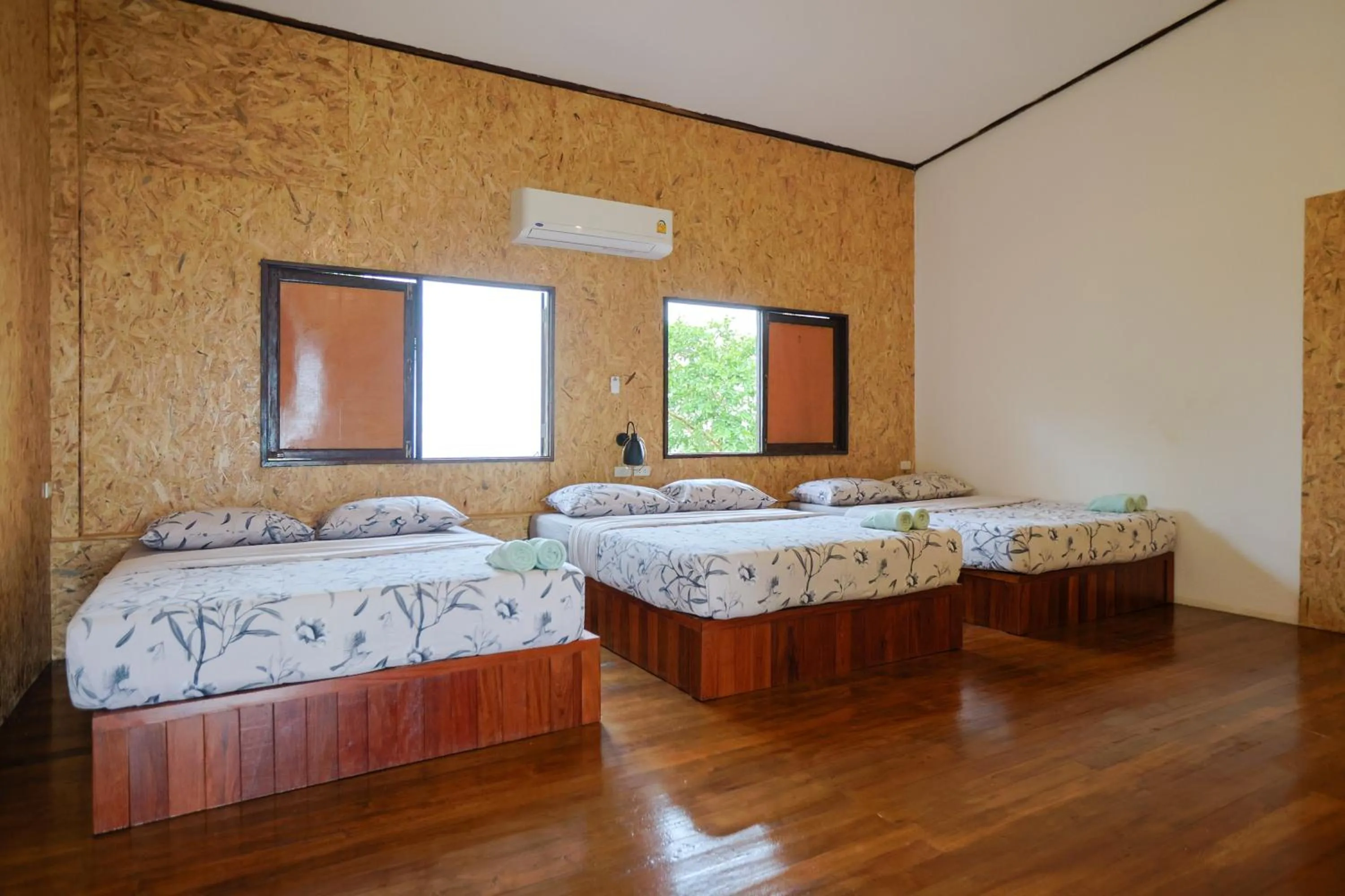 Photo of the whole room, Bed in Parinya Hill Homestay & Cafe Koh Larn