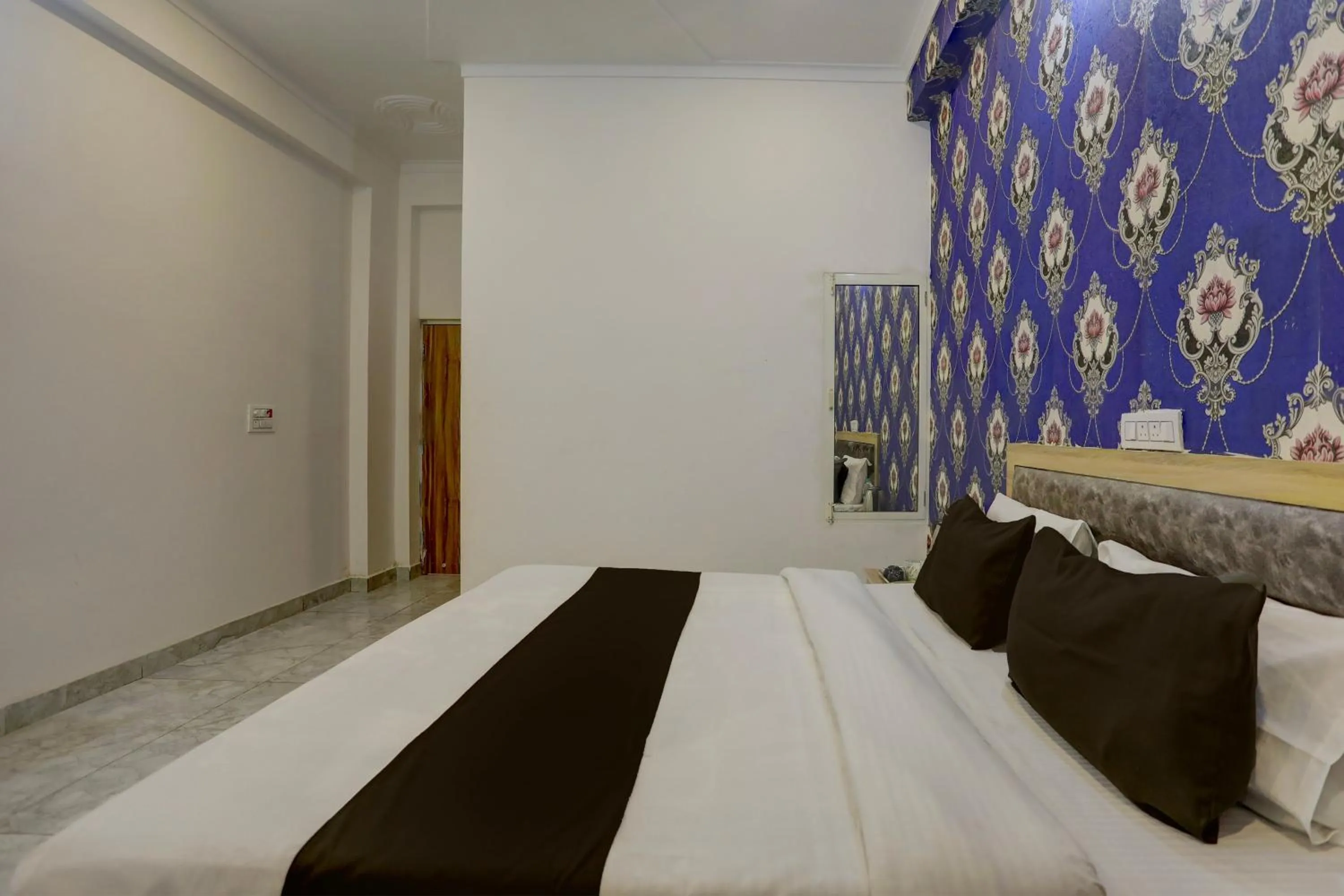 Bedroom in Hotel O BR INN