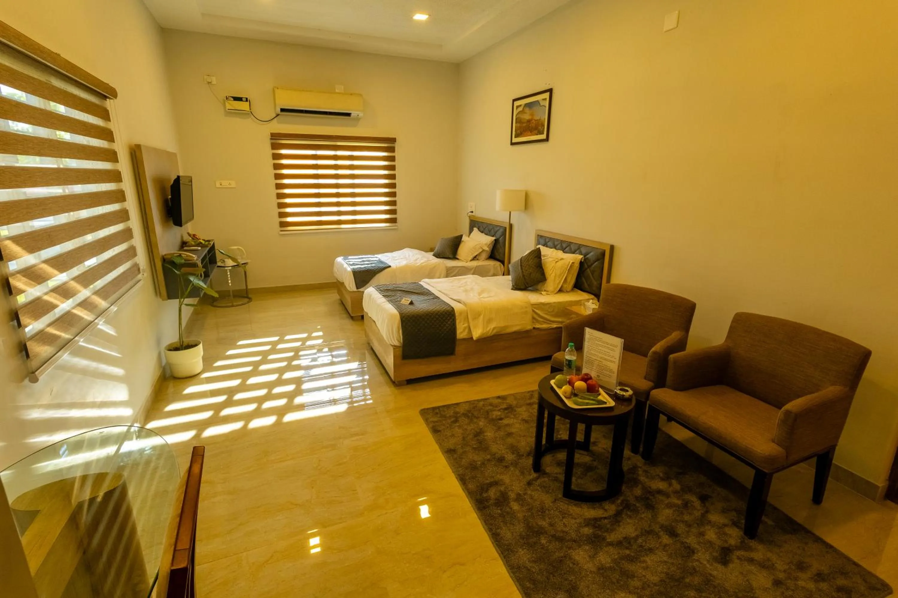 Living room, Bed in Breathe Resorts