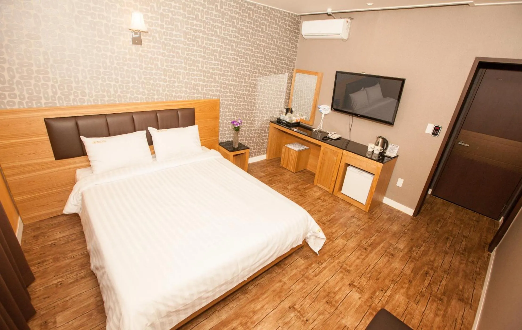 Bed in Pungnam Tourist Hotel