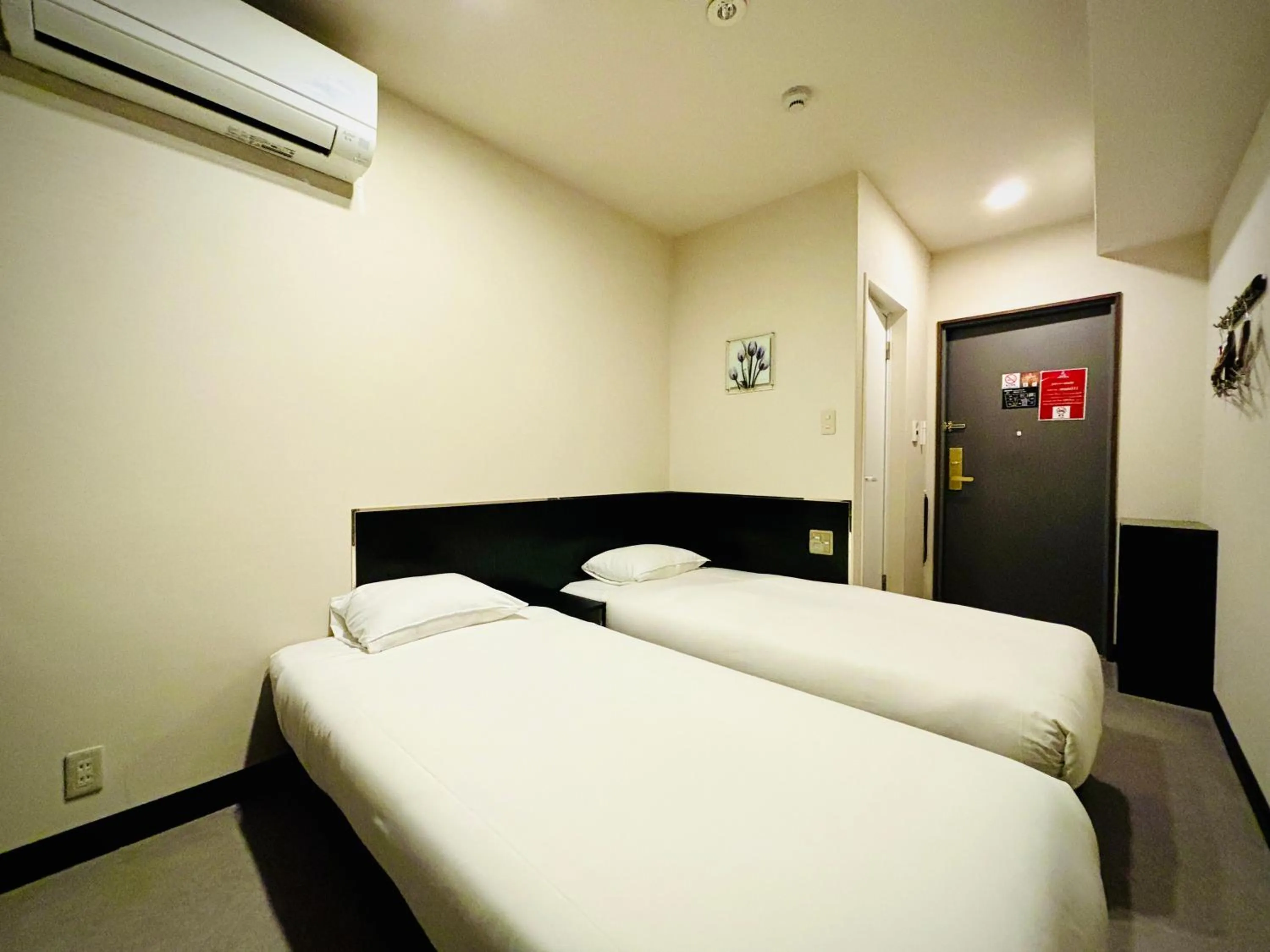 Bed in Hotel Arashi Namba No002