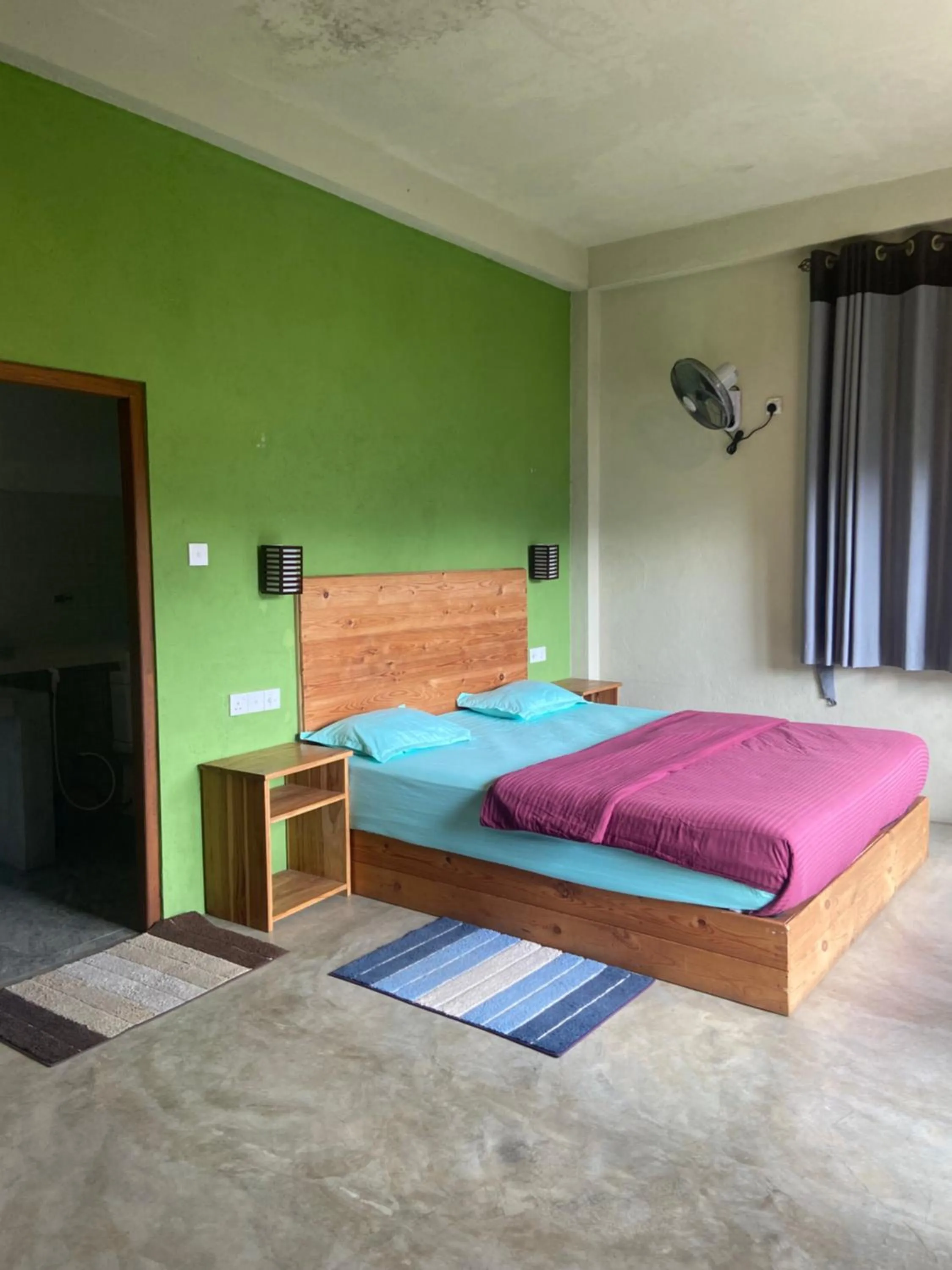 Bed in Raveena Guest House