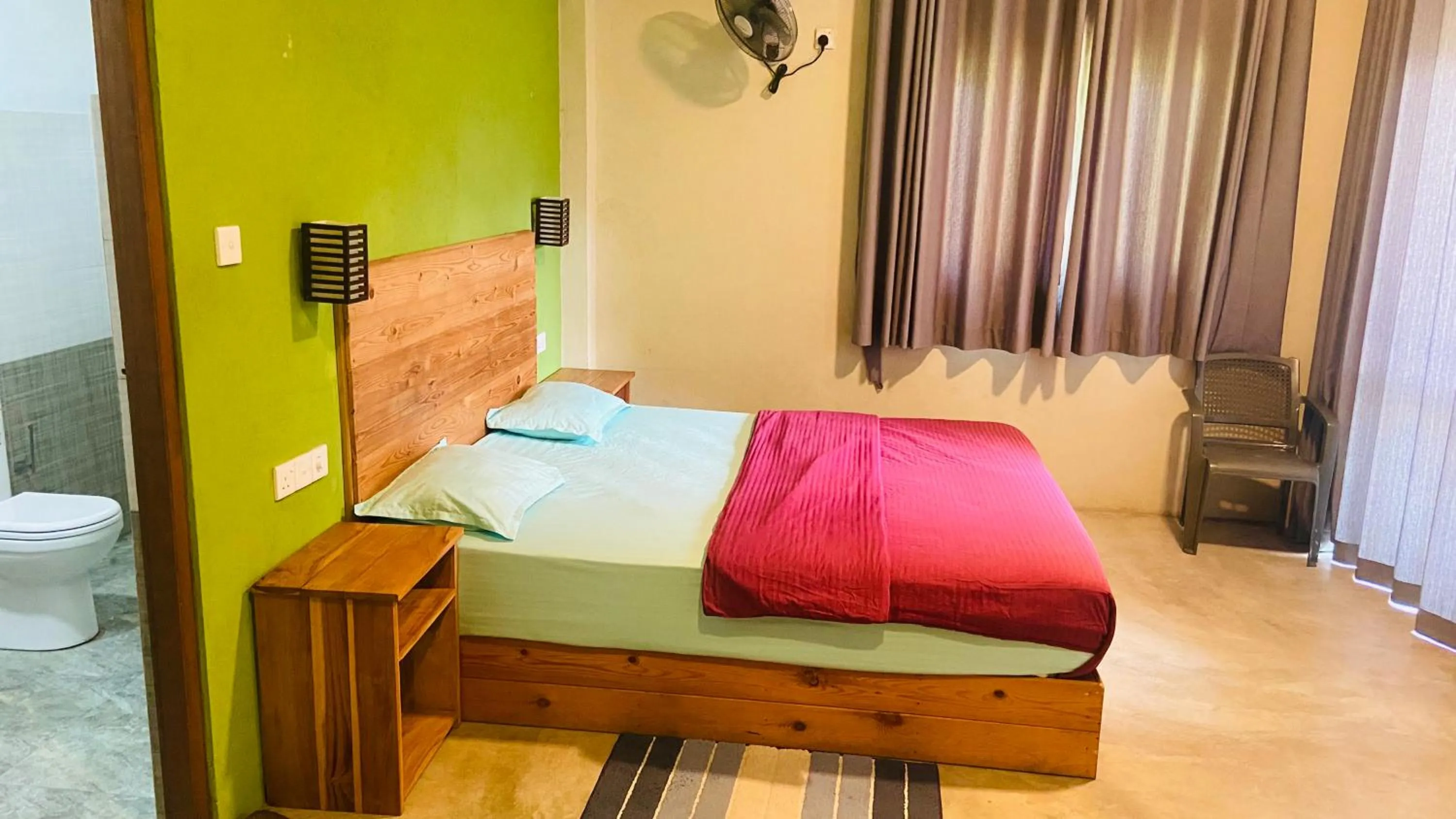 Bed in Raveena Guest House