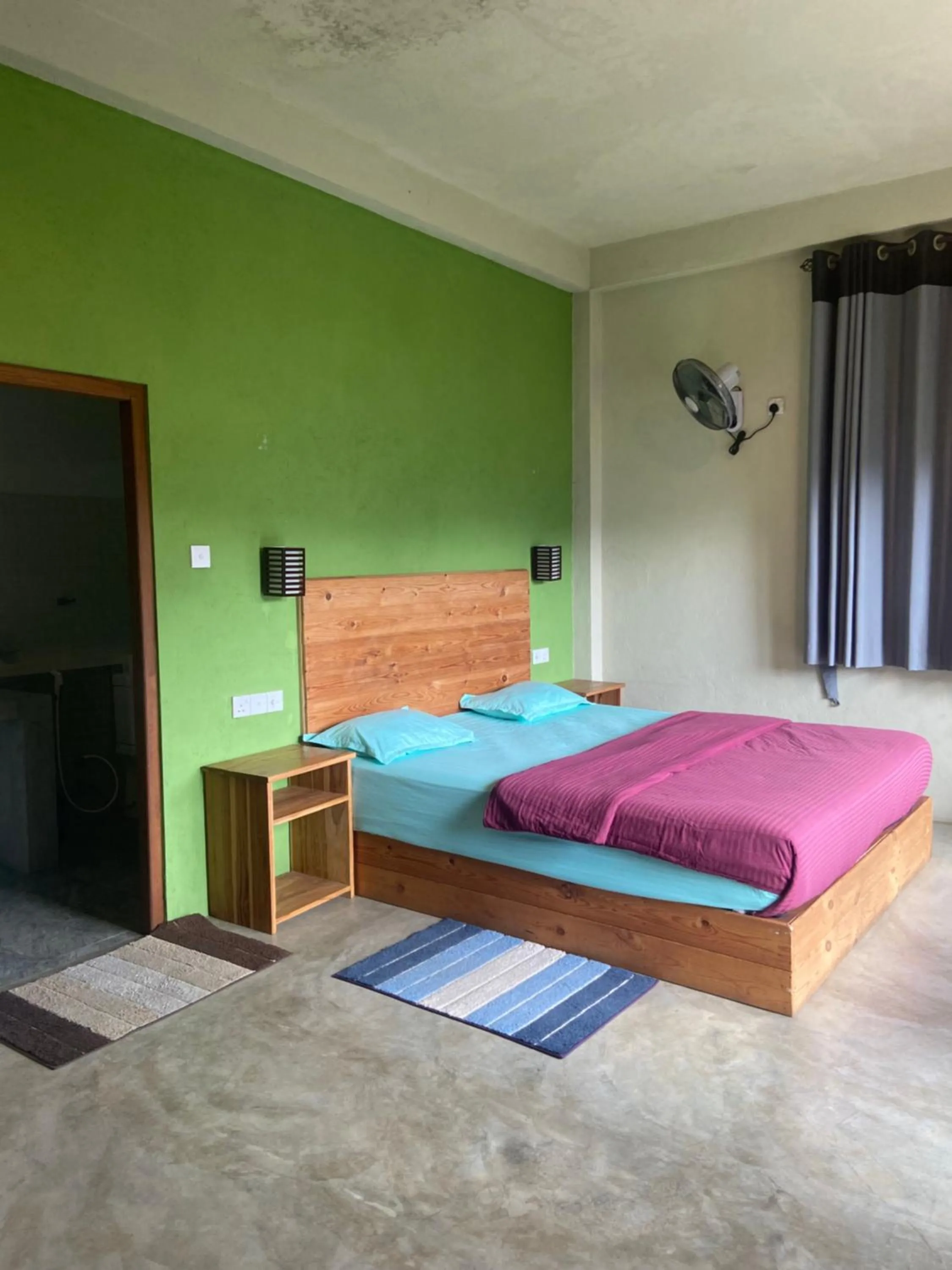 Bed in Raveena Guest House