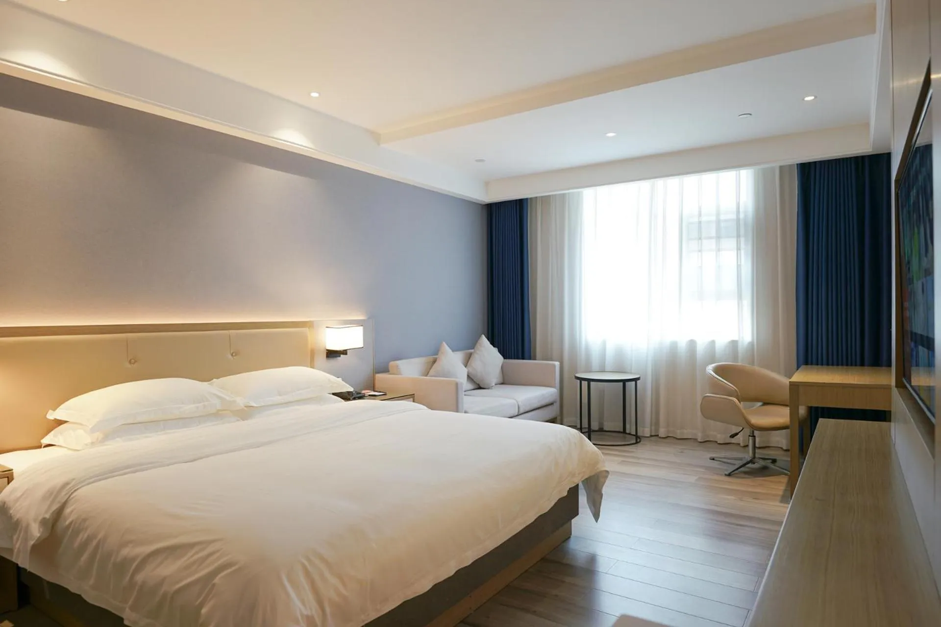 Photo of the whole room, Bed in Paco Hotel Guangzhou North Railway Station