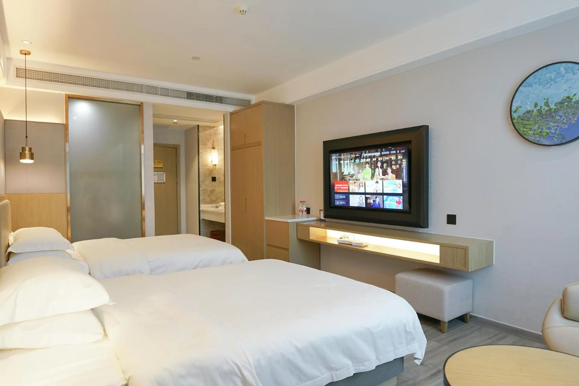 Photo of the whole room, Bed in Paco Hotel Guangzhou North Railway Station