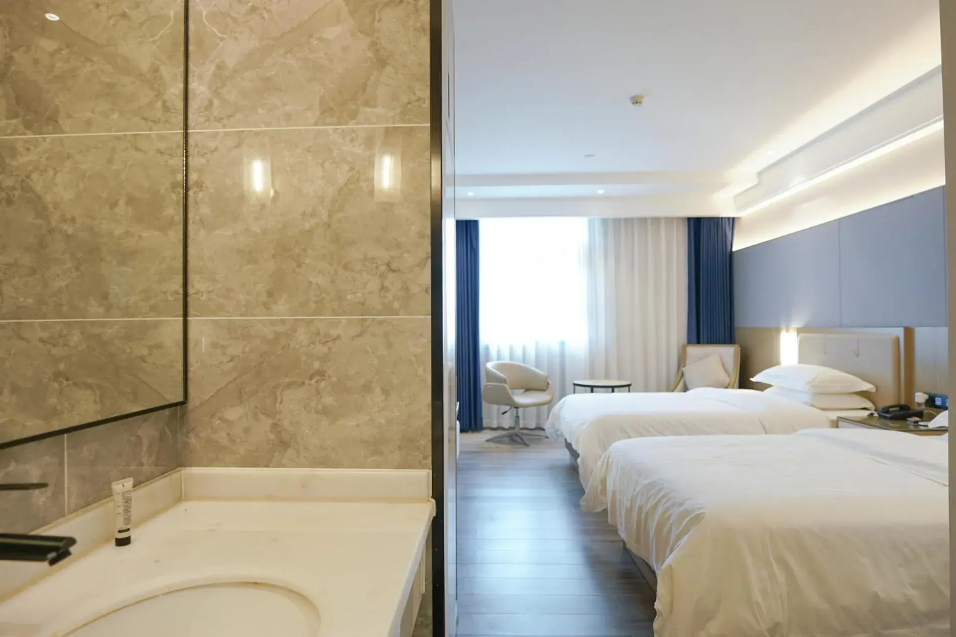 Deluxe Twin Room in Paco Hotel Guangzhou North Railway Station Deluxe Twin Room in Paco Hotel Guangzhou North Railway Station