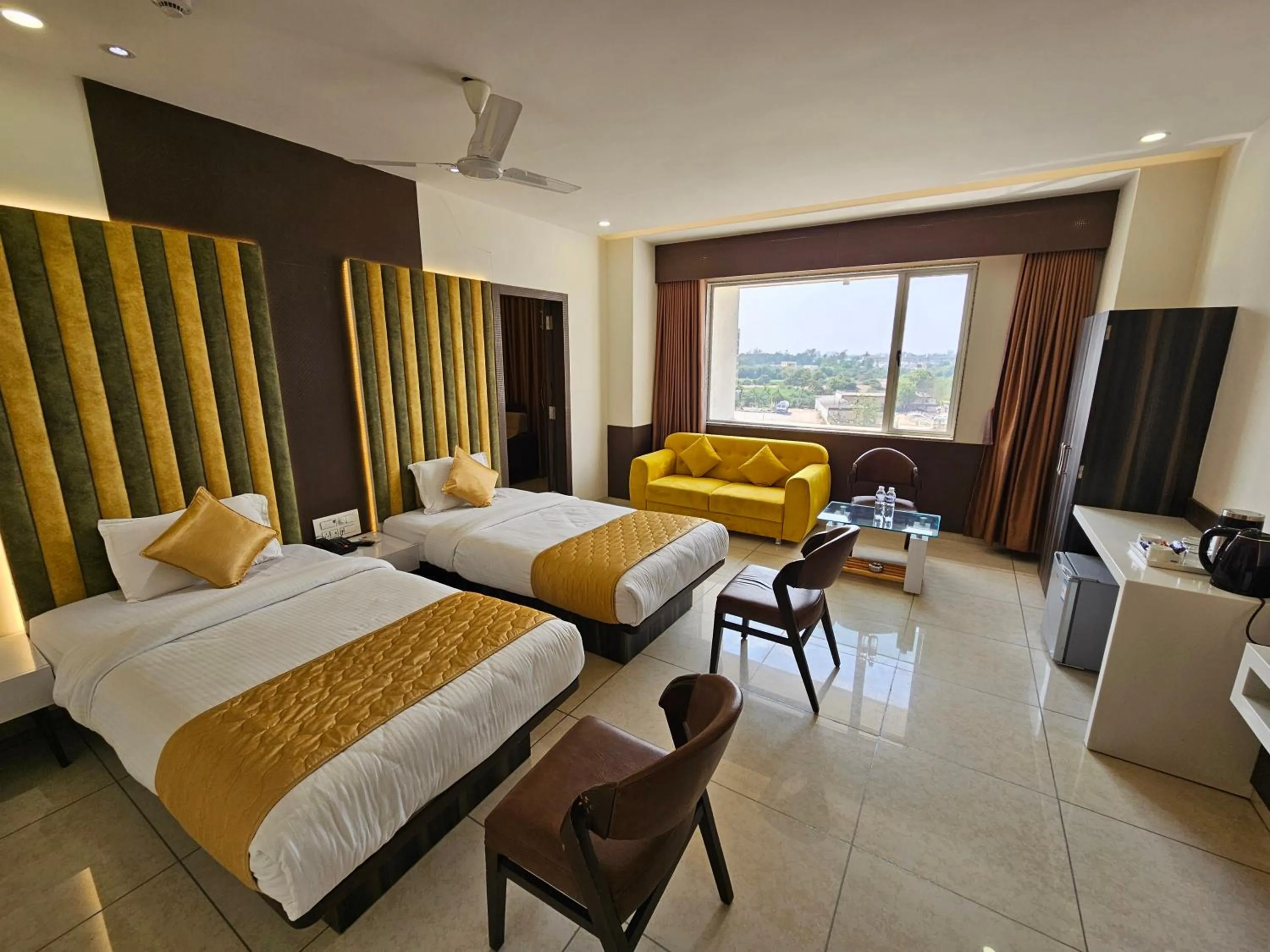 Photo of the whole room, Bed in Hotel Grand Darshan Vadodara