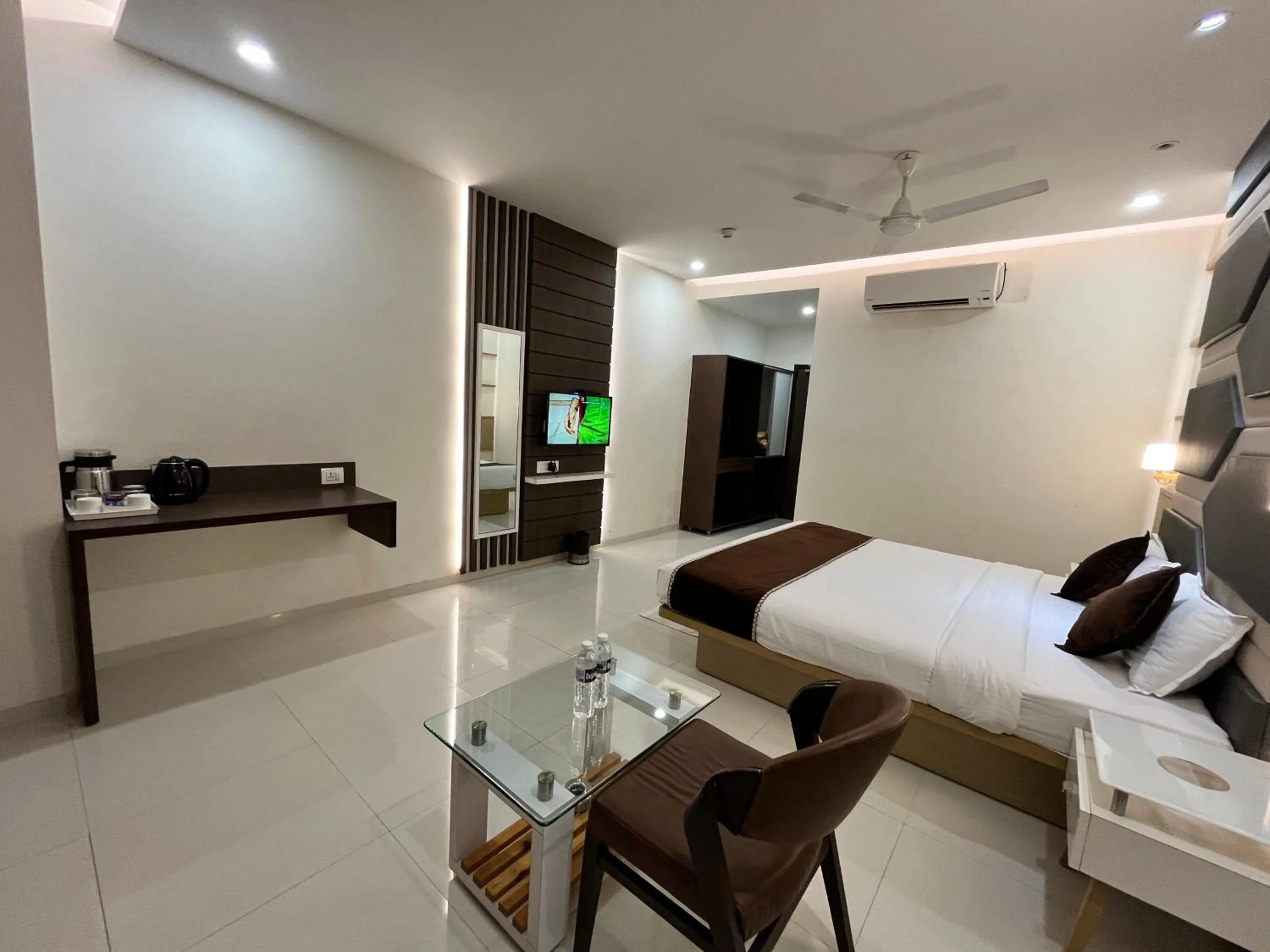 Bed in Hotel Grand Darshan Vadodara