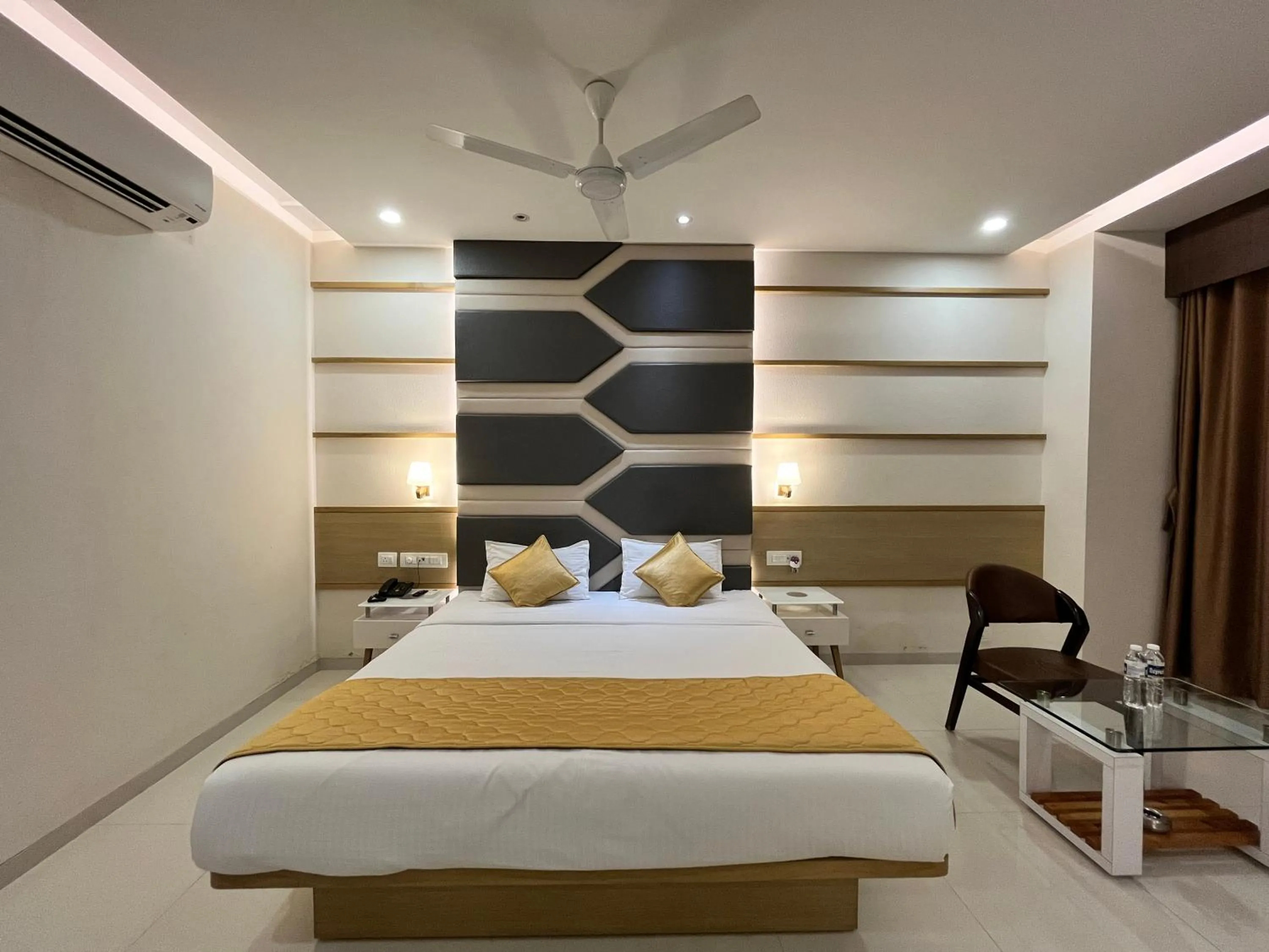 Bed in Hotel Grand Darshan Vadodara