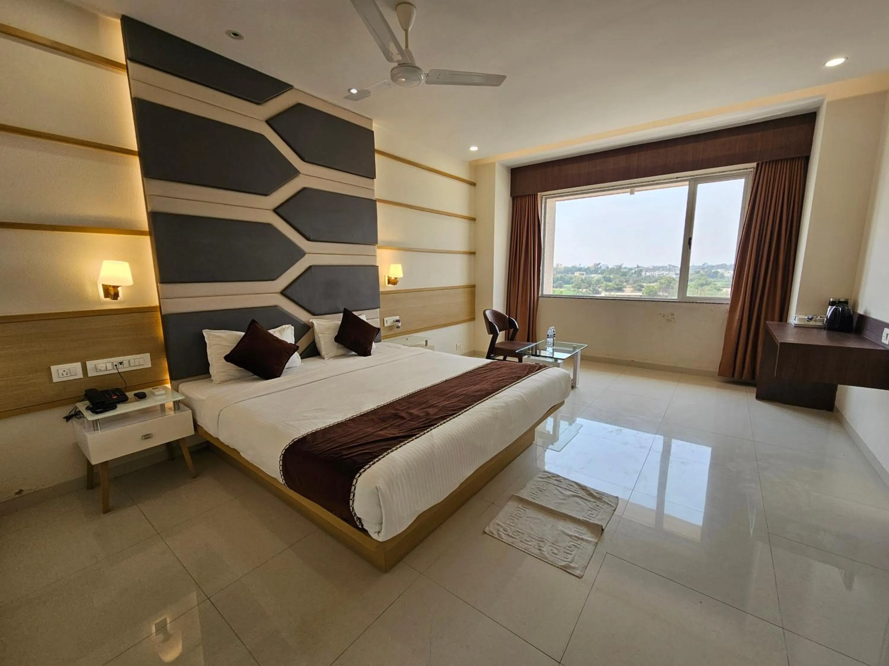 Photo of the whole room, Bed in Hotel Grand Darshan Vadodara