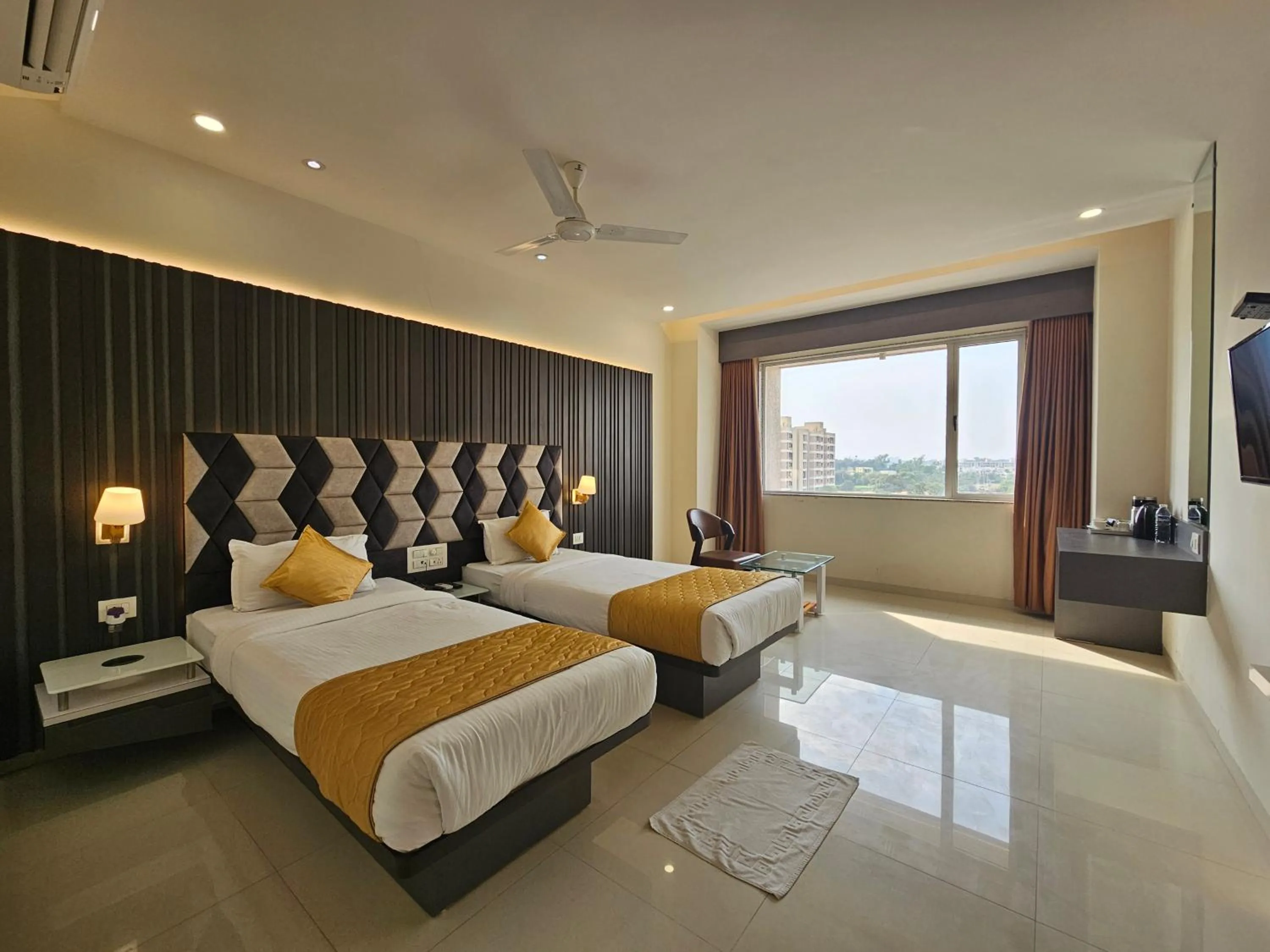 Photo of the whole room, Bed in Hotel Grand Darshan Vadodara