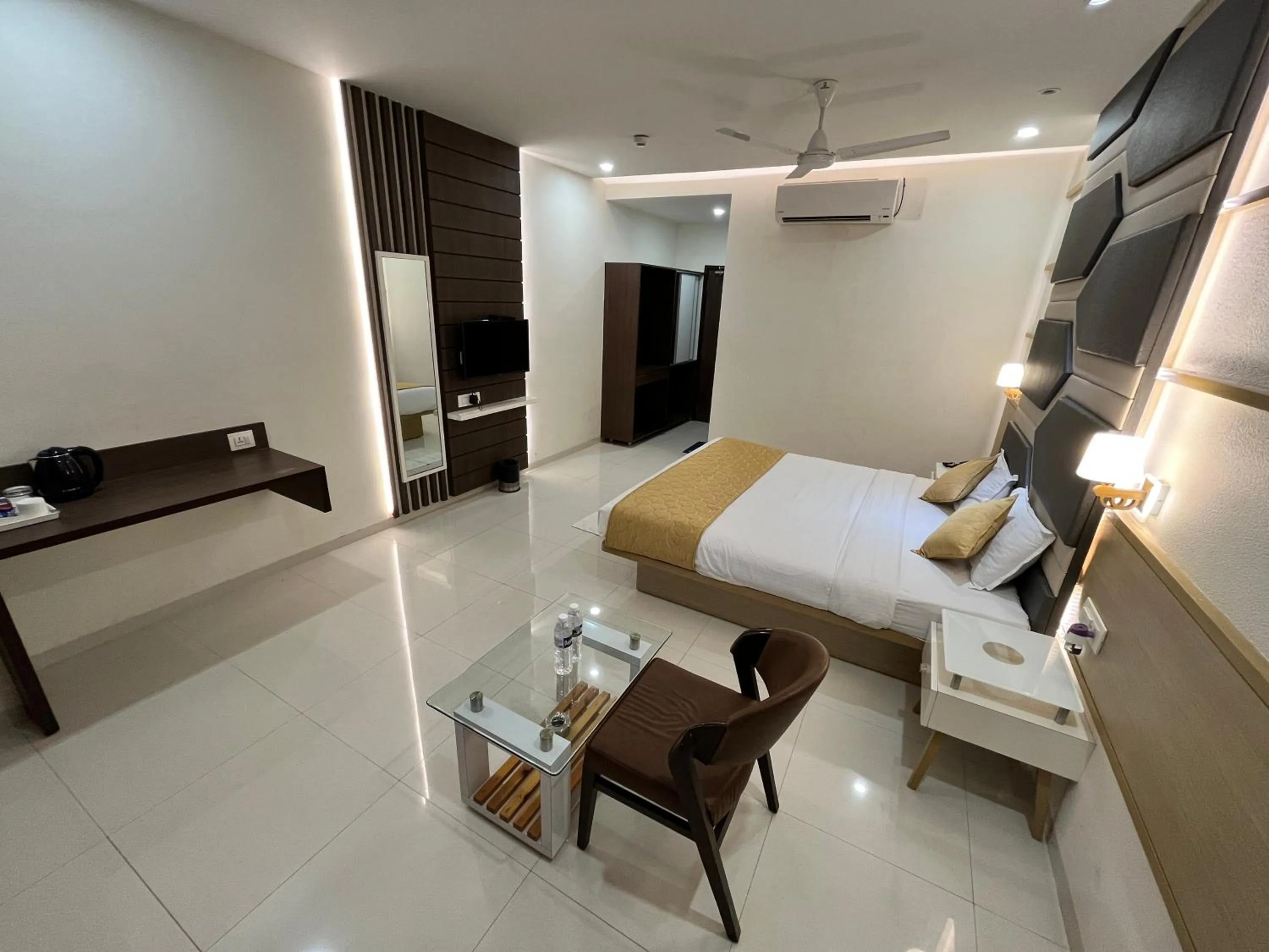 Bed in Hotel Grand Darshan Vadodara