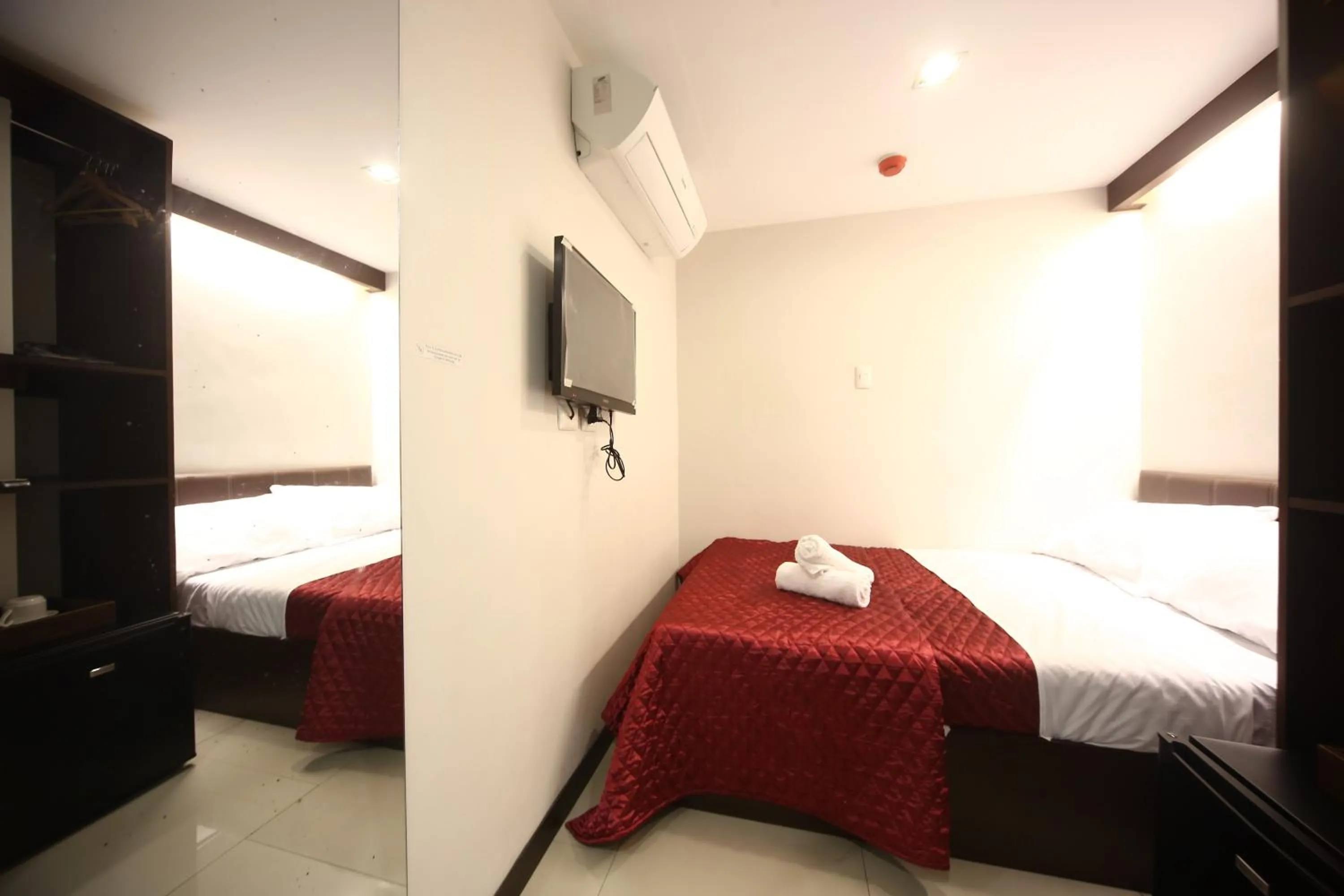 Bed in Regina Hometel