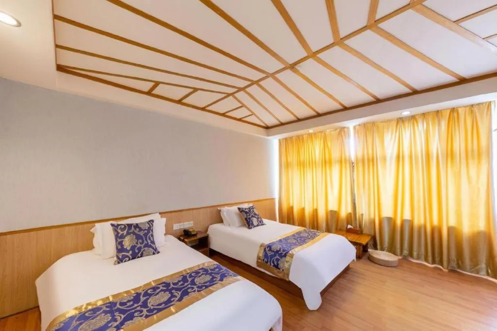 Bed in Yue Lai Yue Hotel