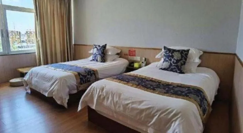 Bed in Yue Lai Yue Hotel