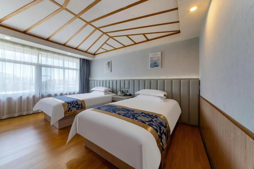 Bed in Yue Lai Yue Hotel