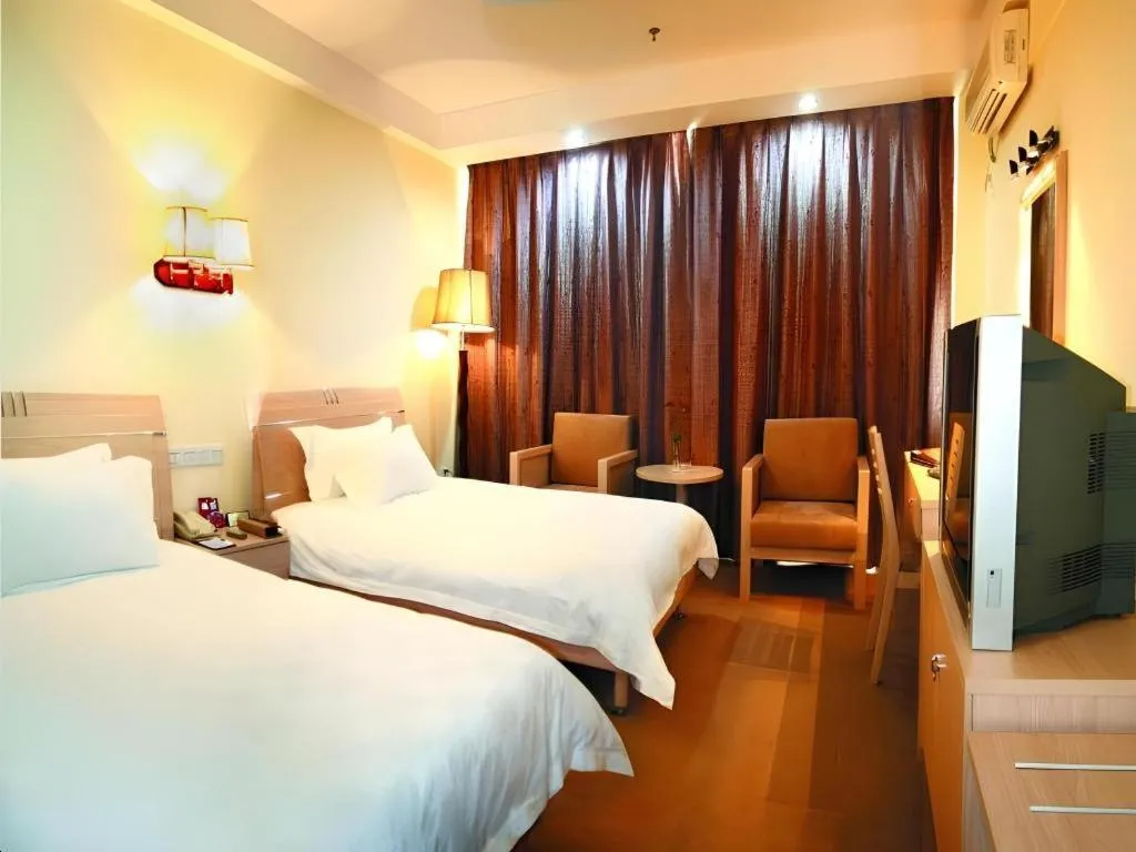 Bed in Yue Lai Yue Hotel