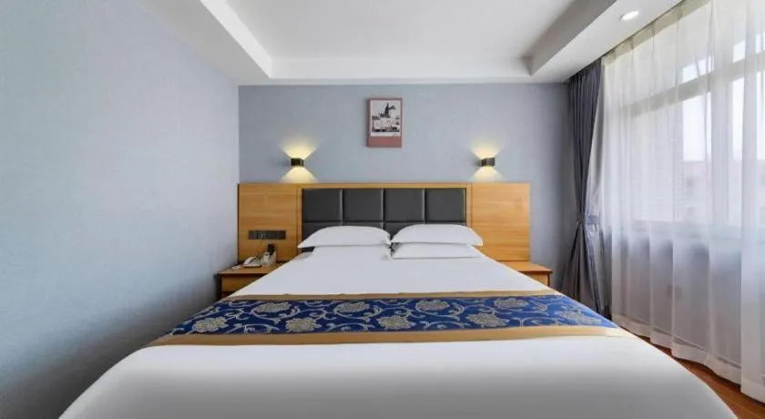 Bed in Yue Lai Yue Hotel