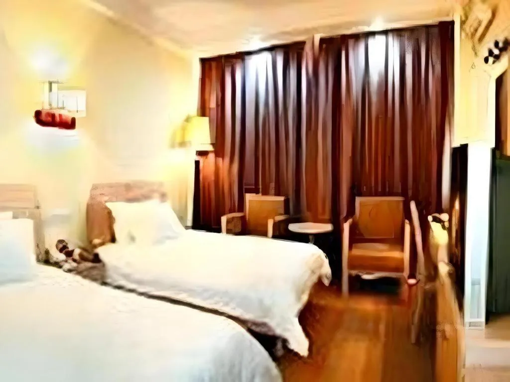 Bed in Yue Lai Yue Hotel