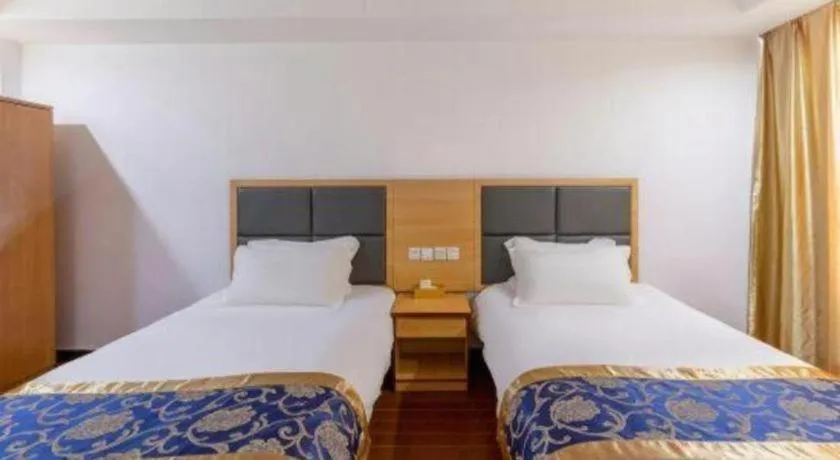 Bed in Yue Lai Yue Hotel