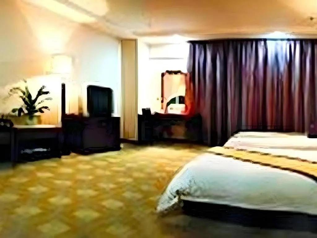 Bed in Yue Lai Yue Hotel