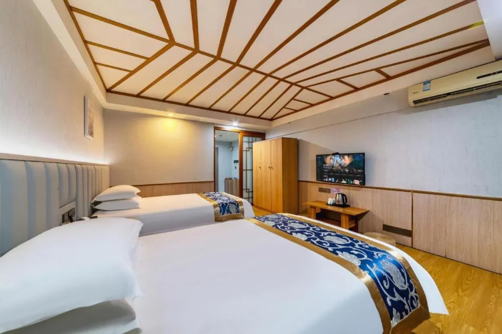 Bed in Yue Lai Yue Hotel
