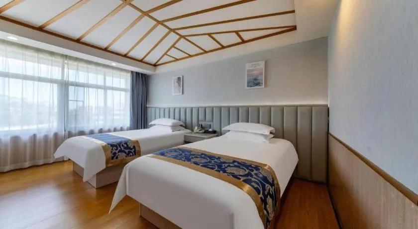 Bed in Yue Lai Yue Hotel