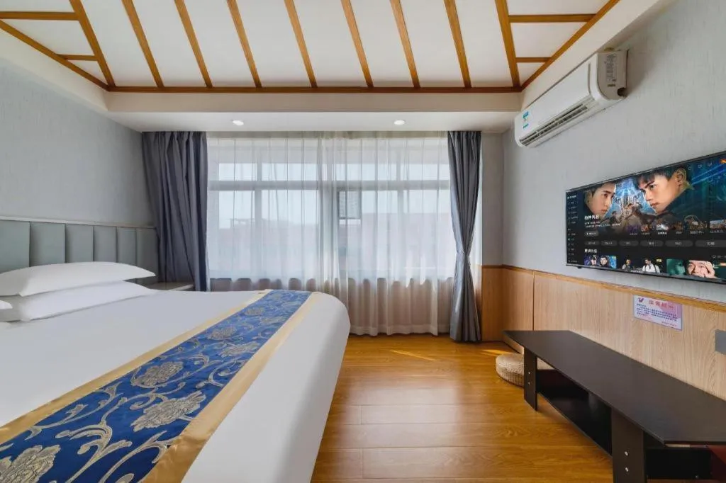 Bed in Yue Lai Yue Hotel