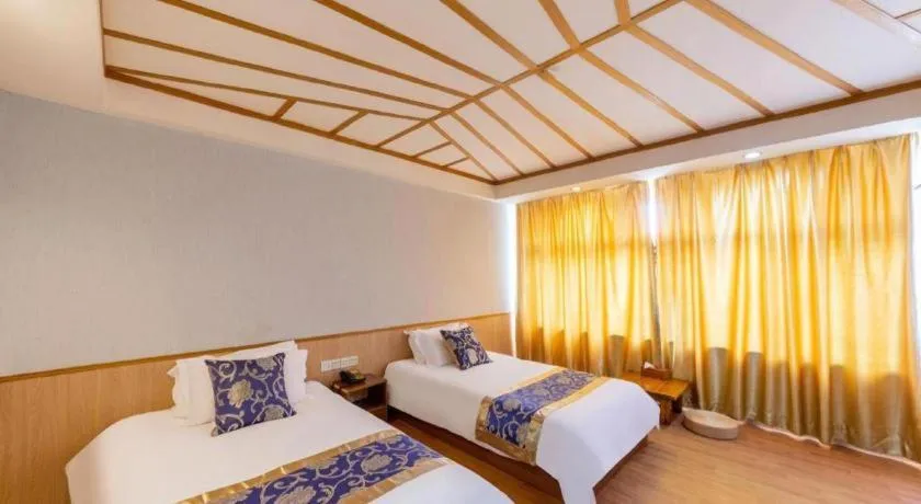 Bed in Yue Lai Yue Hotel