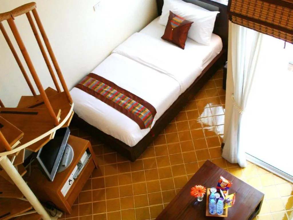 Bed in Gerard Habitat Hotel