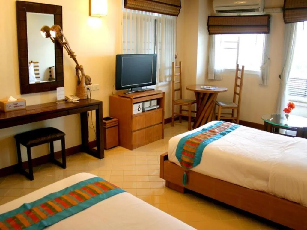 Bed in Gerard Habitat Hotel