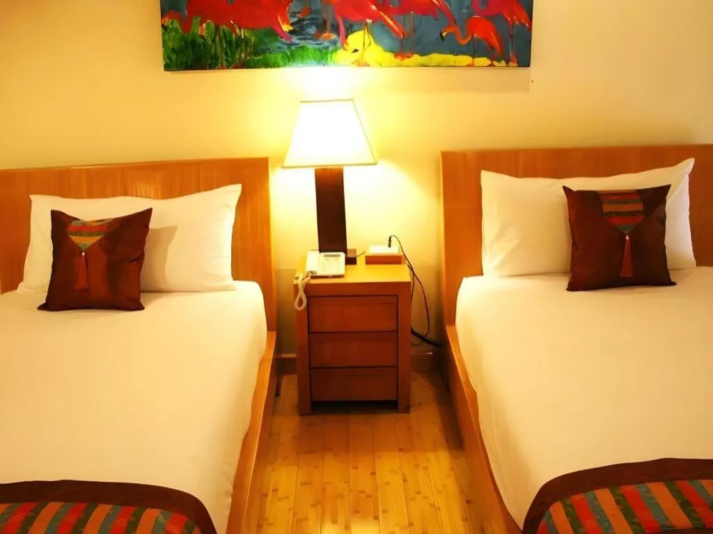 Bed in Gerard Habitat Hotel