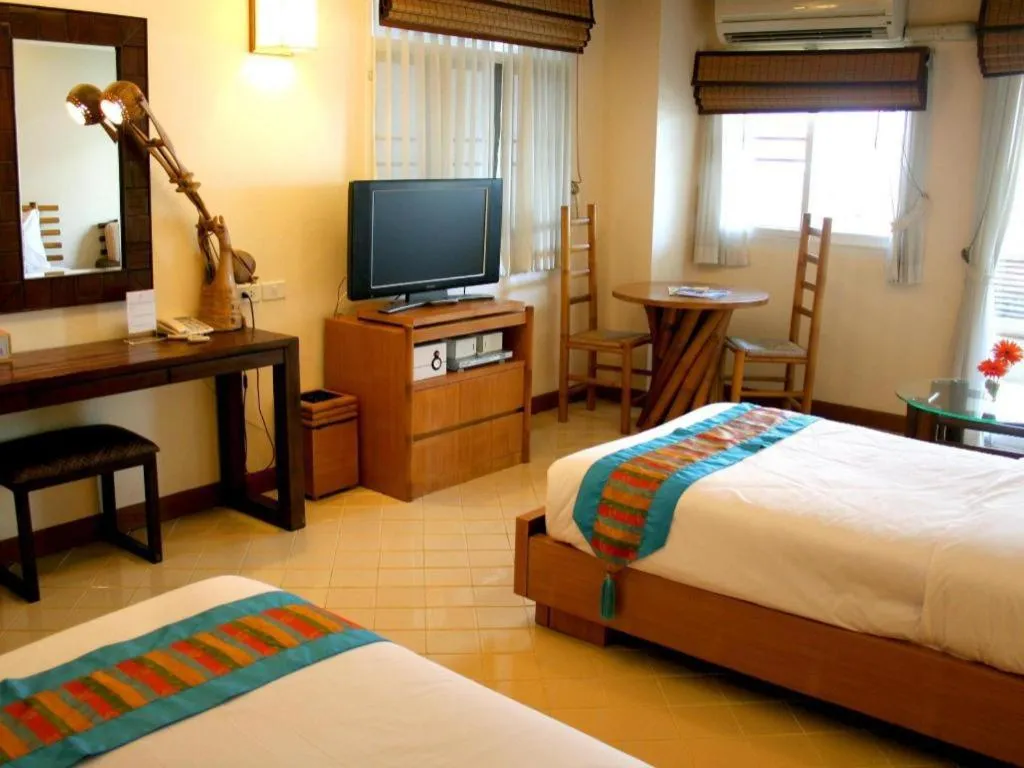 Bed in Gerard Habitat Hotel