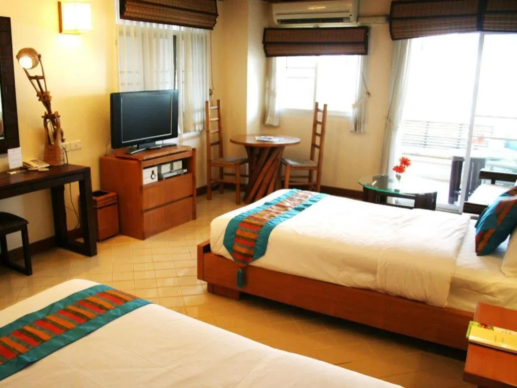 Bed in Gerard Habitat Hotel